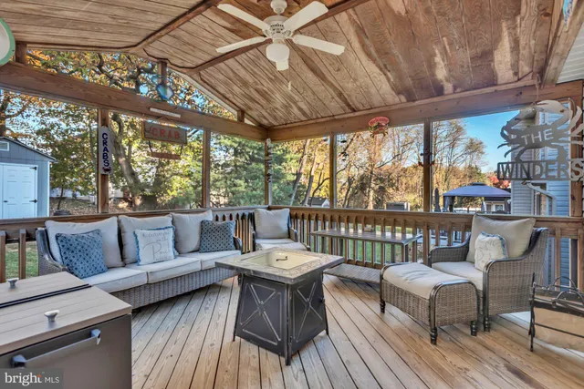 a view of a chairs in wooden deck