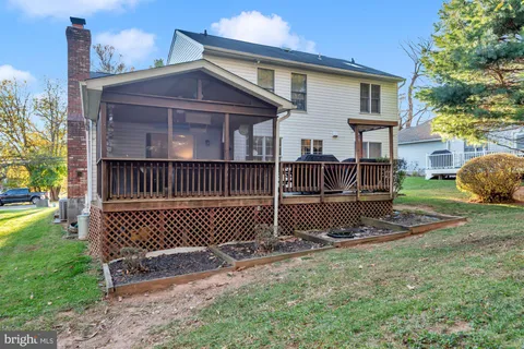 a view of a backyard of the house