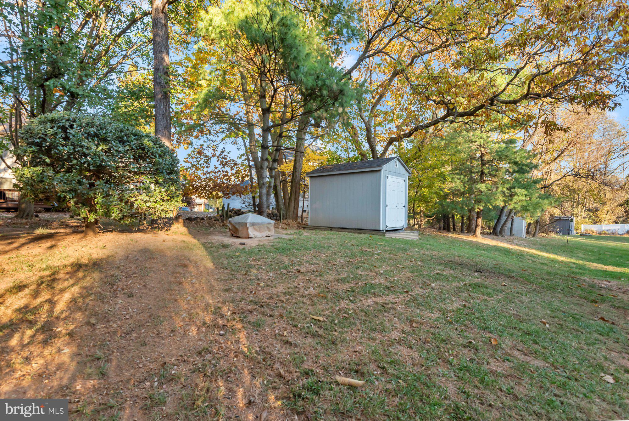 604 Academy Avenue Owings Mills, MD 21117 - Photo 47 of 51 a view of a yard with large trees
