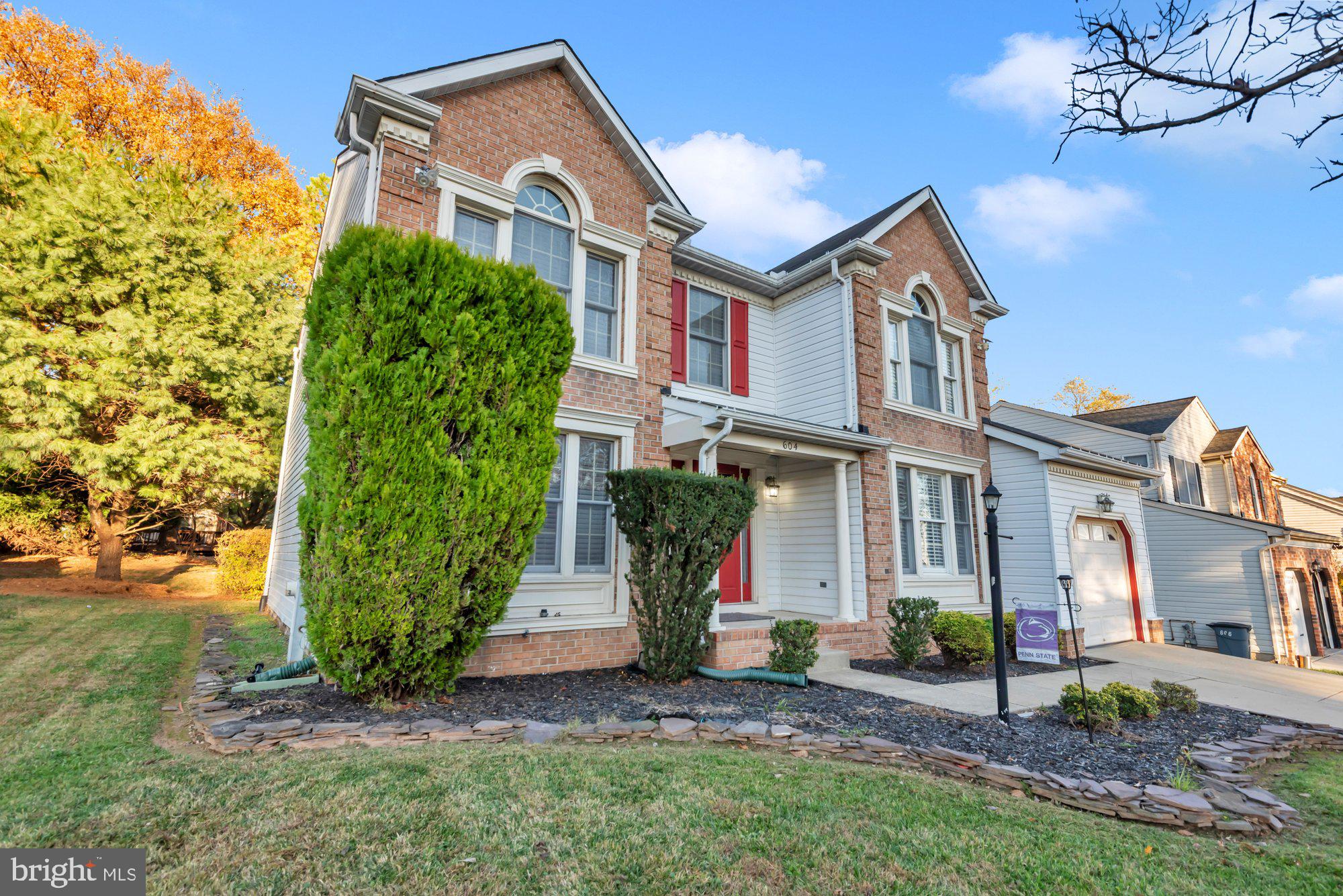 604 Academy Avenue Owings Mills, MD 21117 - Photo 49 of 51 a front view of a house with a yard