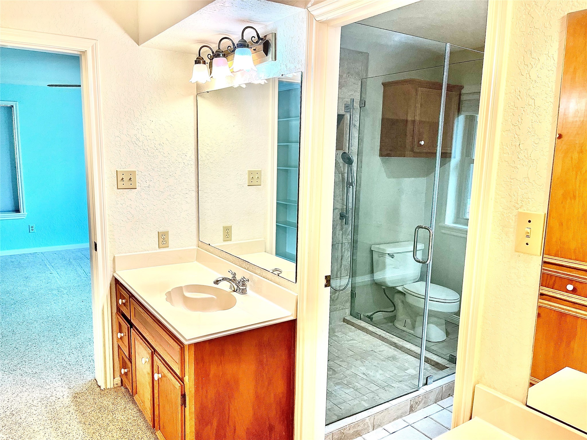 37243 FM 521 Road Bay City, TX 77414 - Photo 16 of 50 a bathroom with a sink a toilet and shower