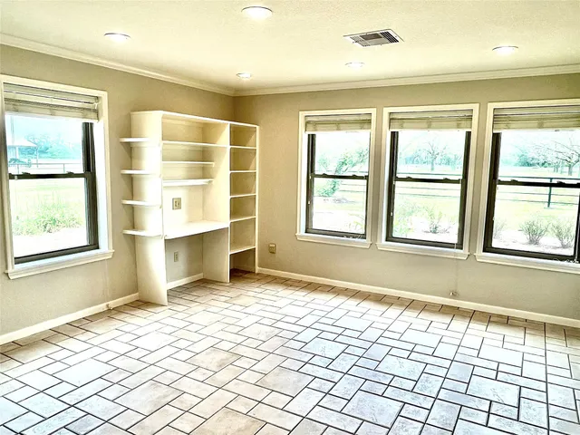 a hallway with a large window