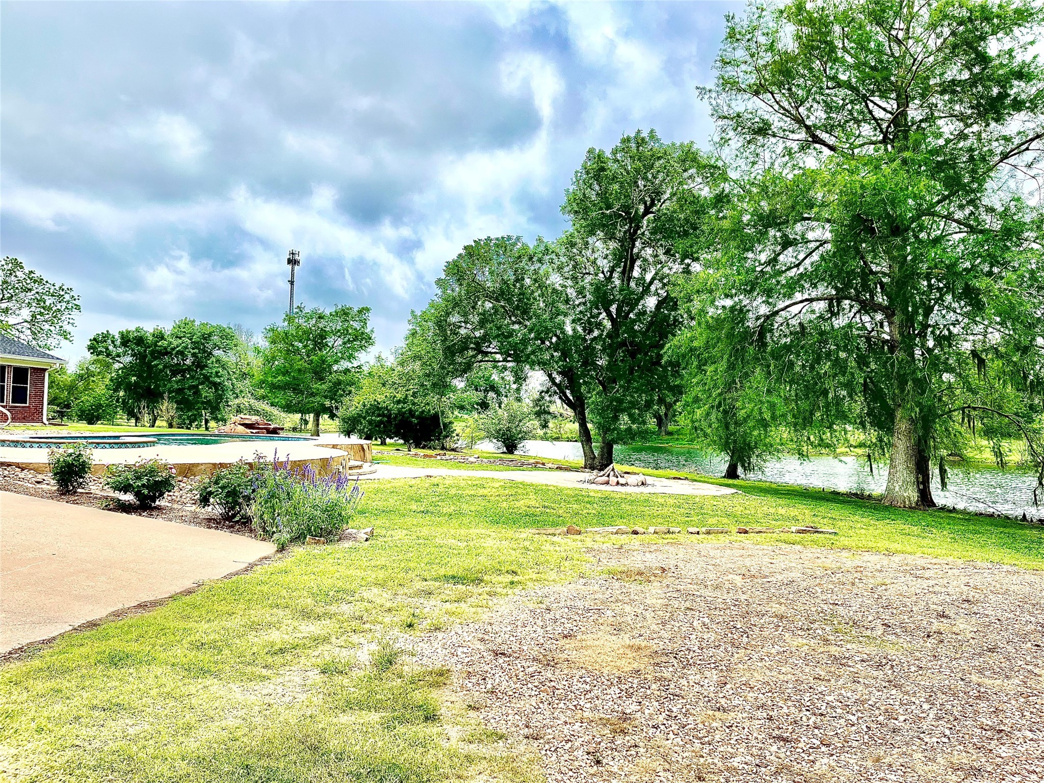 37243 FM 521 Road Bay City, TX 77414 - Photo 31 of 50 a view of a park with large trees and a big yard