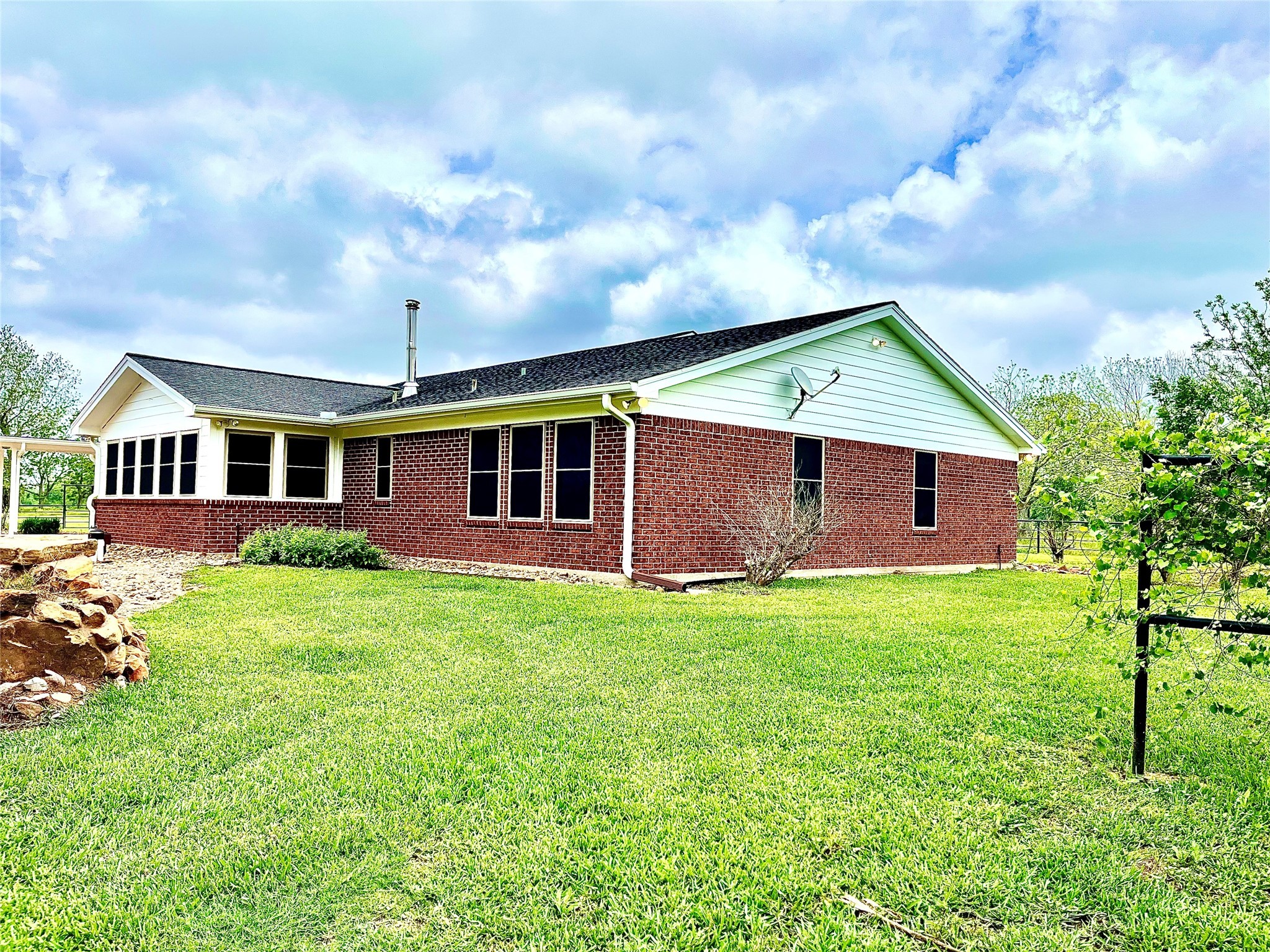 37243 FM 521 Road Bay City, TX 77414 - Photo 34 of 50 a backyard of a house with table and chairs