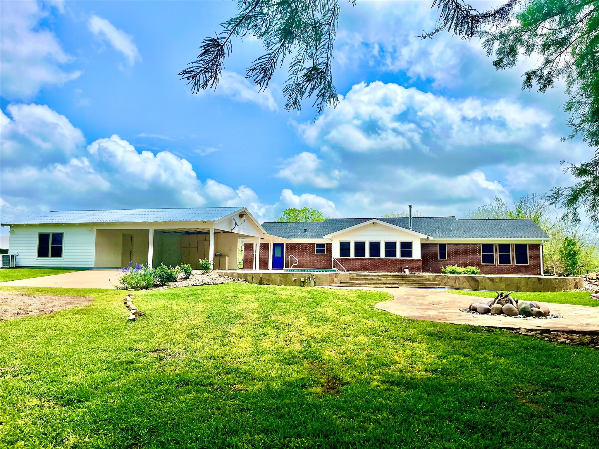 37243 FM 521 Road Bay City, TX 77414 - Photo 39 of 50 a front view of house with yard having outdoor seating