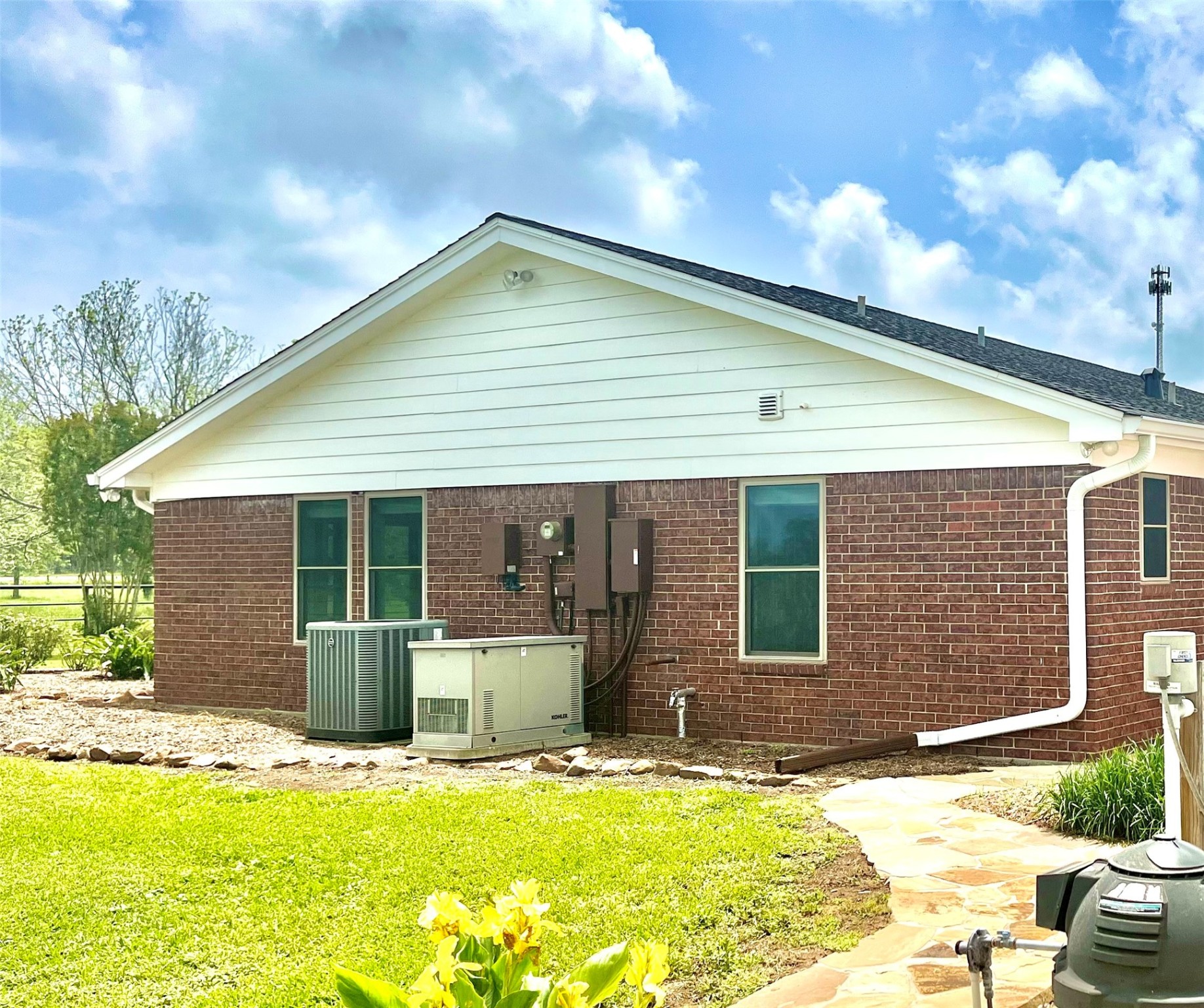 37243 FM 521 Road Bay City, TX 77414 - Photo 48 of 50 a backyard of a house with yard and outdoor seating