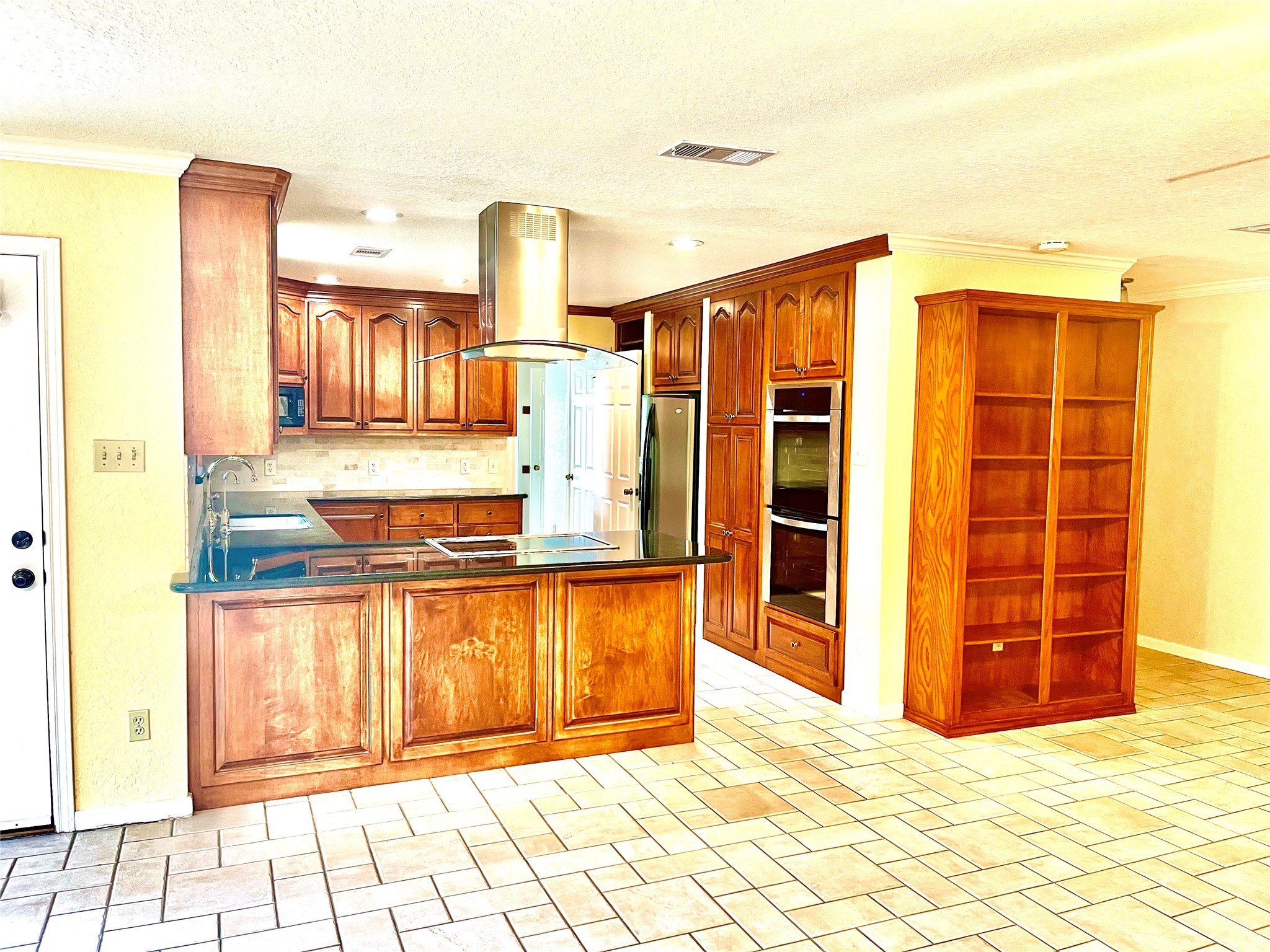 37243 FM 521 Road Bay City, TX 77414 - Photo 9 of 50 a view of a kitchen with stainless steel appliances granite countertop a refrigerator and a stove