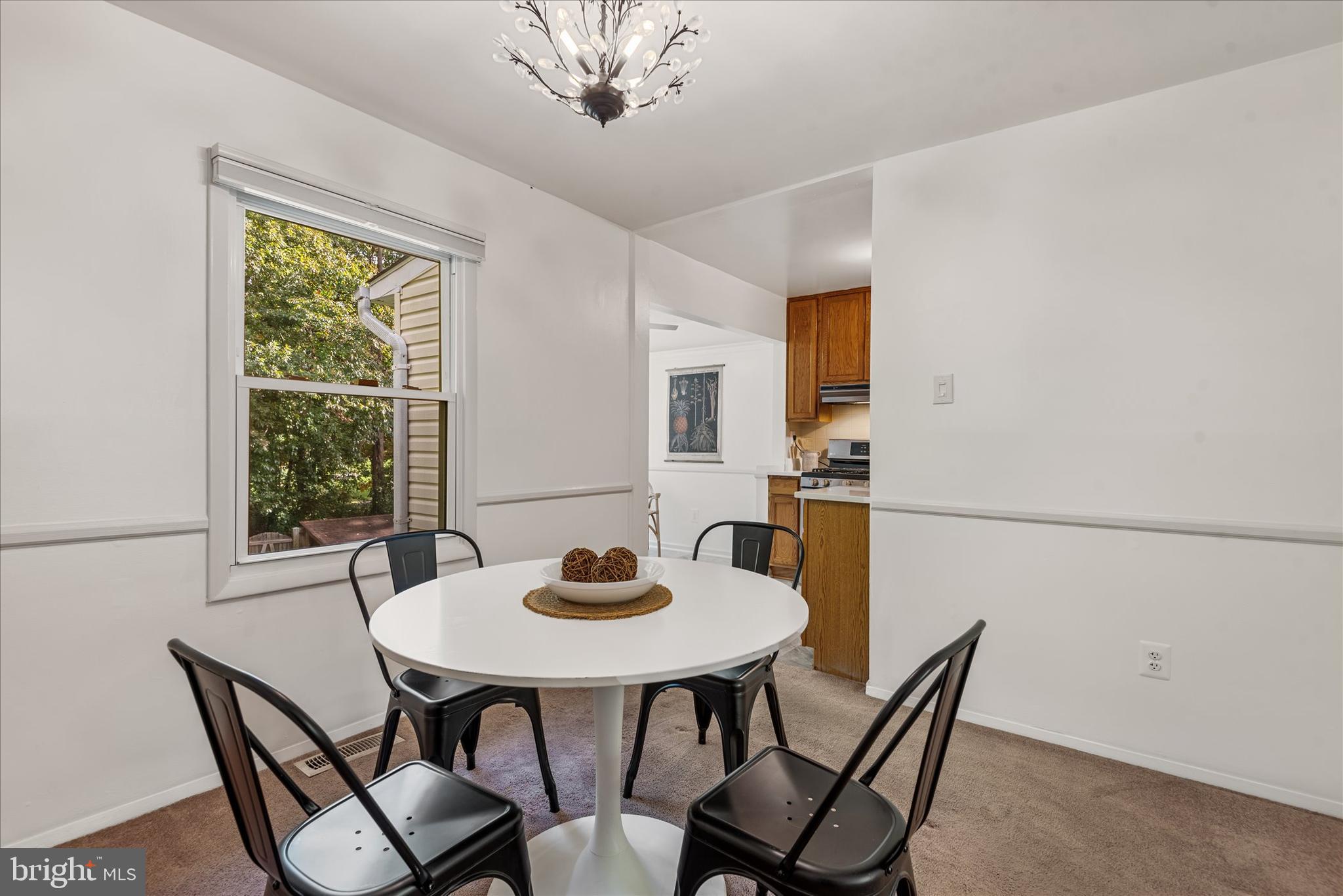 7967 Citadel Drive Severn, MD 21144 - Photo 11 of 52 a dining room with furniture and window