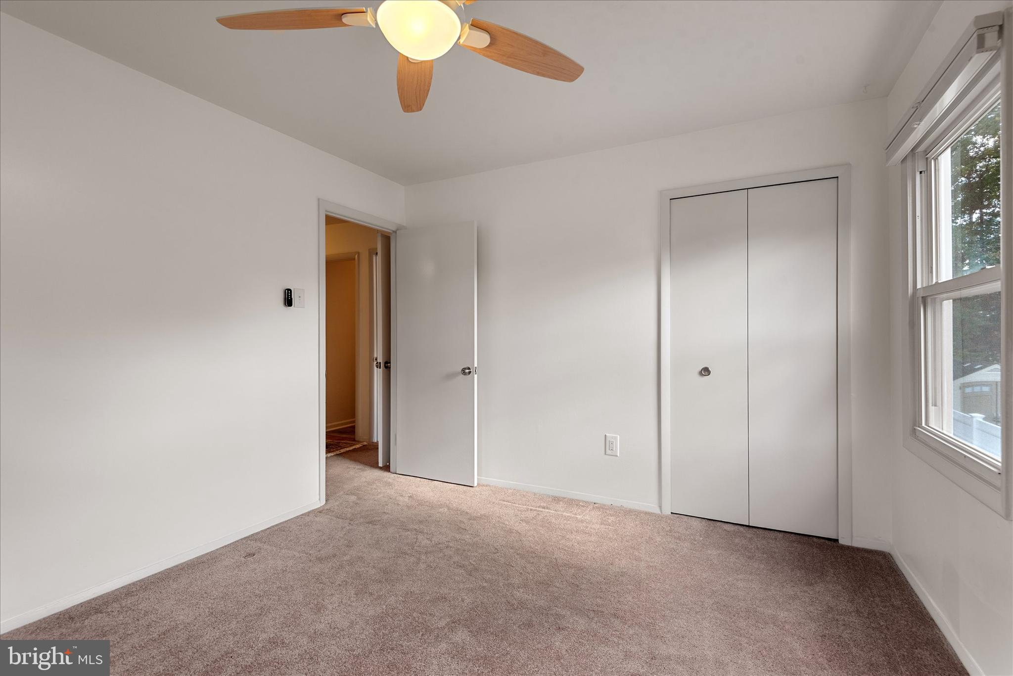 7967 Citadel Drive Severn, MD 21144 - Photo 24 of 52 a view of an empty room with a window