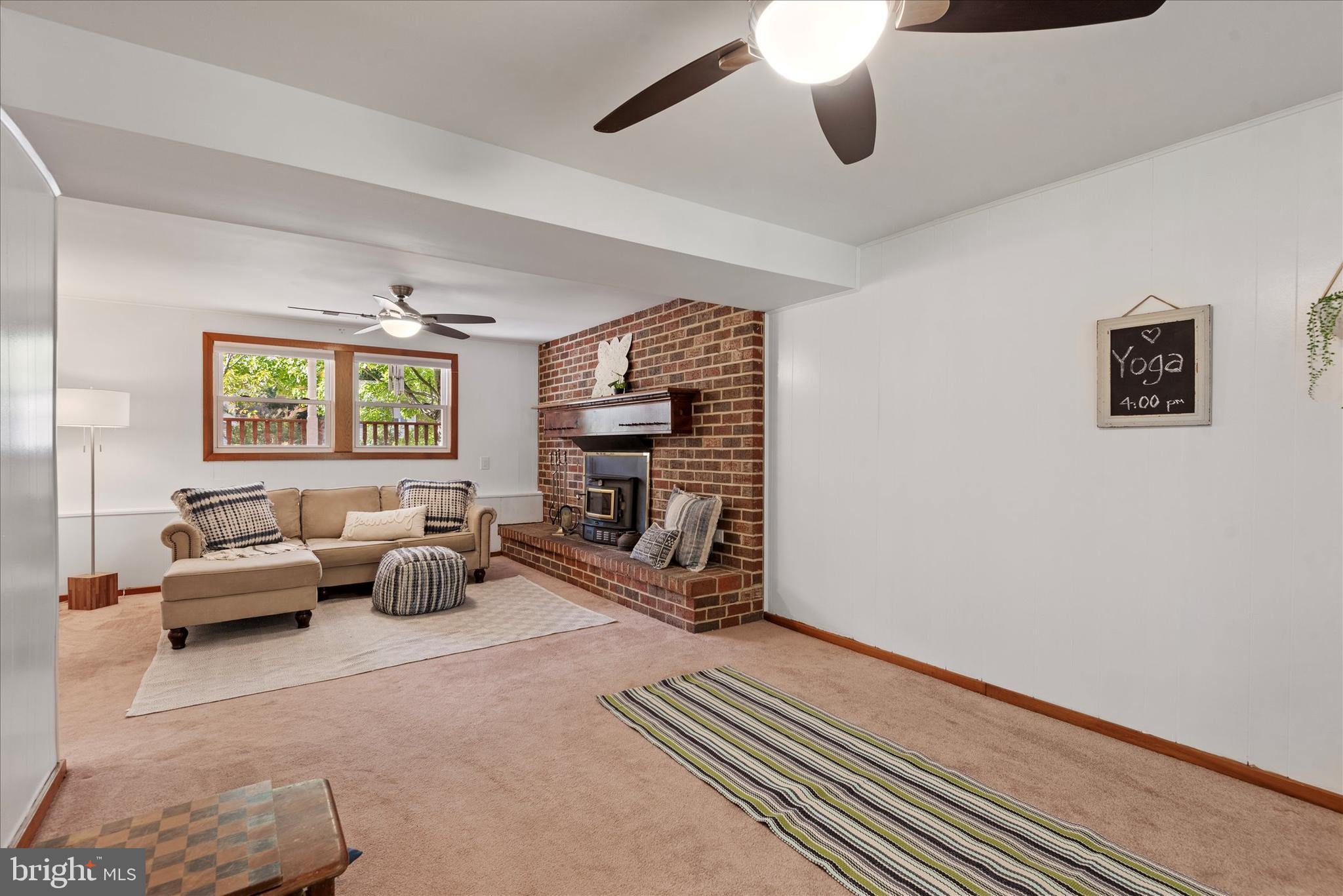 7967 Citadel Drive Severn, MD 21144 - Photo 31 of 52 a living room with furniture and a fireplace