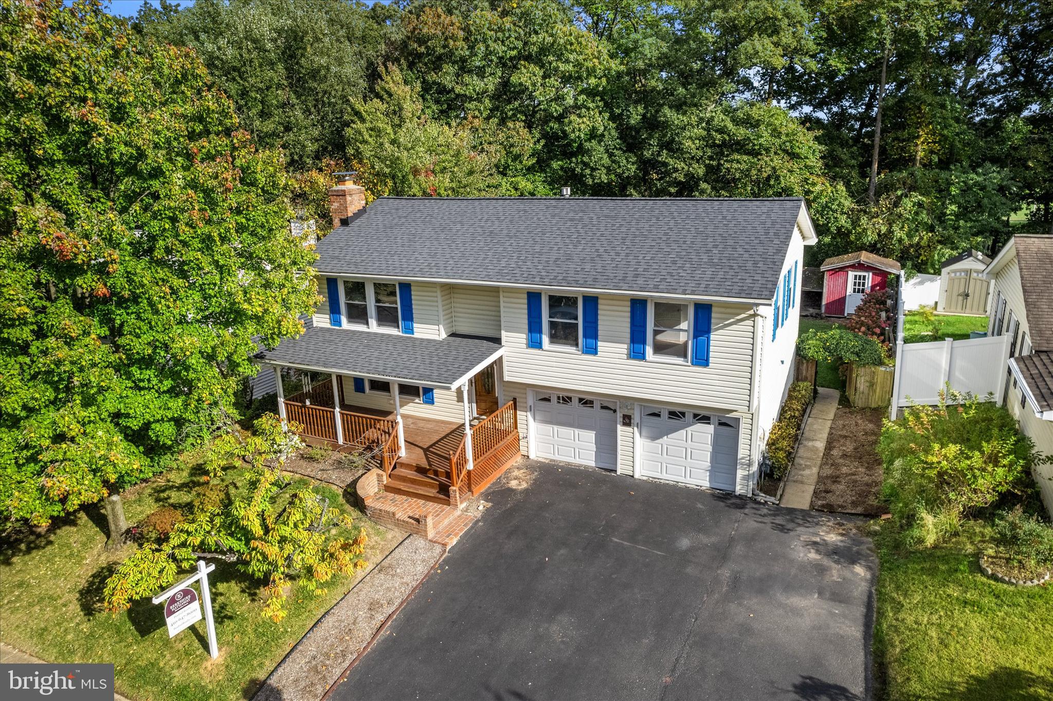 7967 Citadel Drive Severn, MD 21144 - Photo 42 of 52 front view of a house with a yard table and chairs