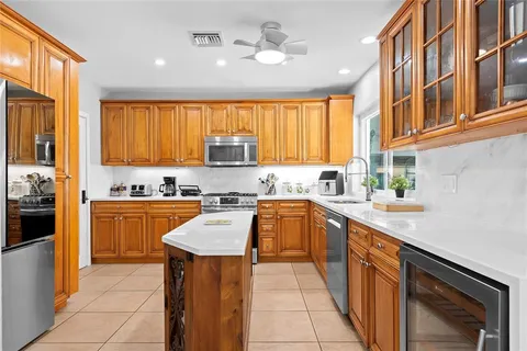 a bedroom with a bed and a desk