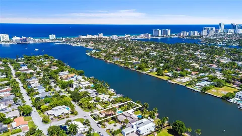a view of an house with swimming pool yard and outdoor seating