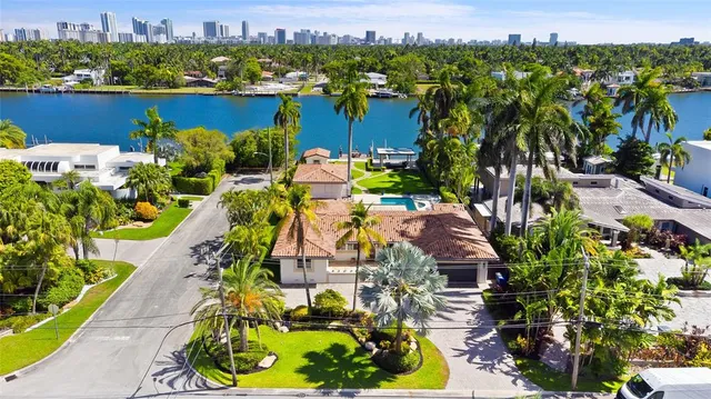 a view of a lake with a building in the background