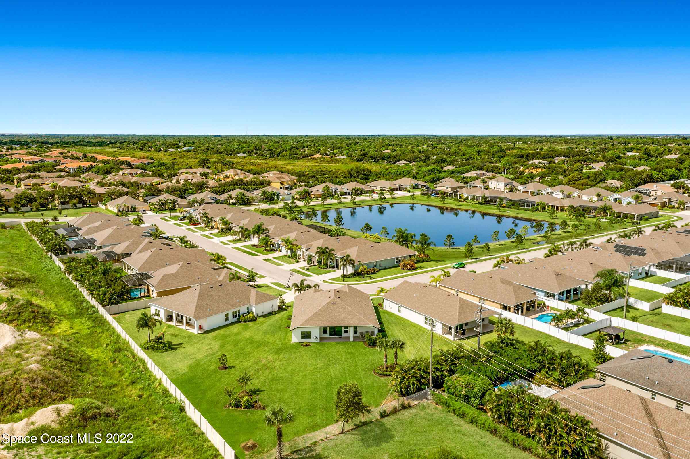 4392 Ruthann Circle Melbourne, FL 32934 - Photo 32 of 36 An aerial view of the back yard