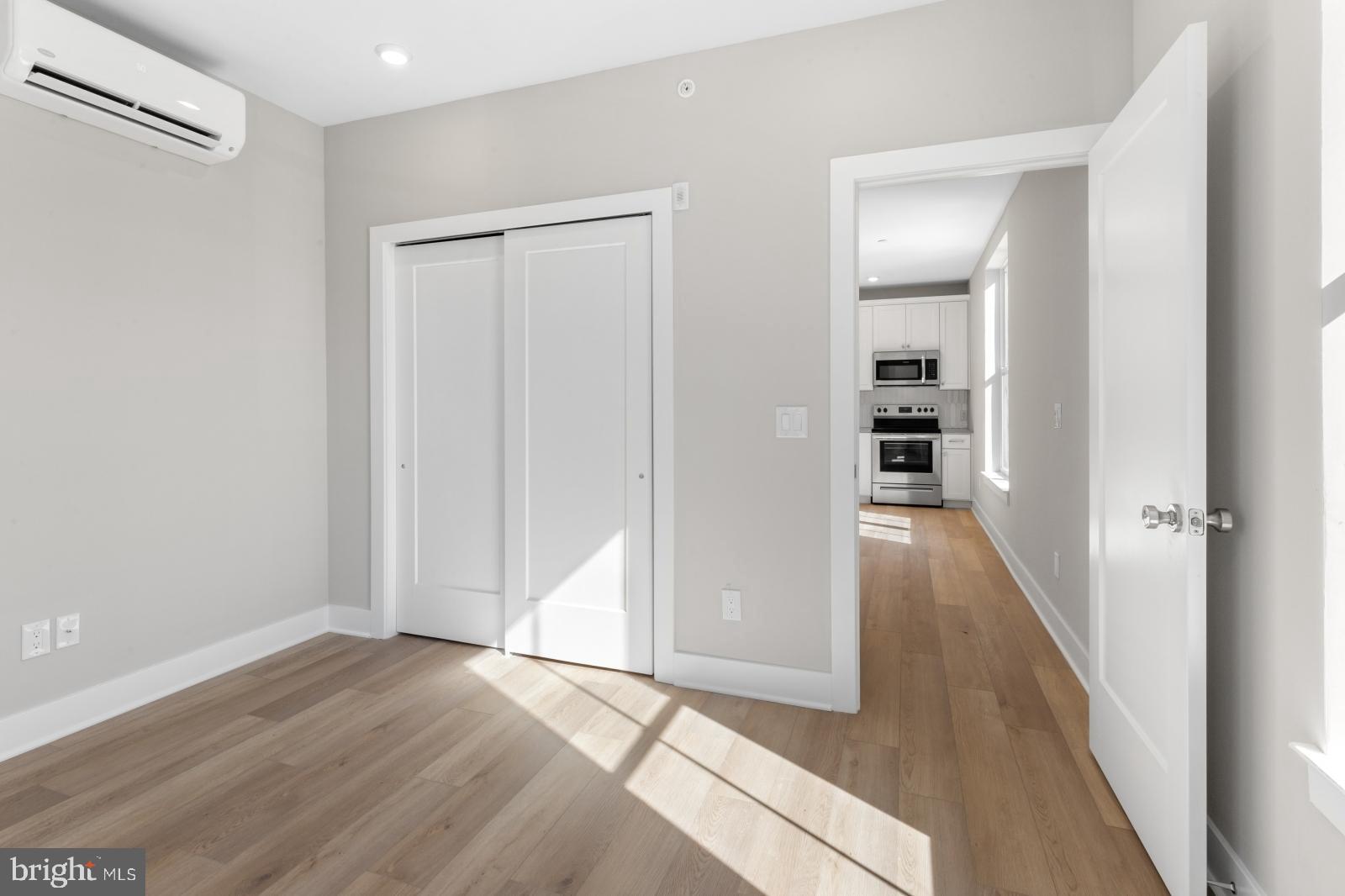6712 Ridge Avenue, Unit 204 Philadelphia, PA 19128 - Photo 11 of 18 a view of hallway with wooden floor
