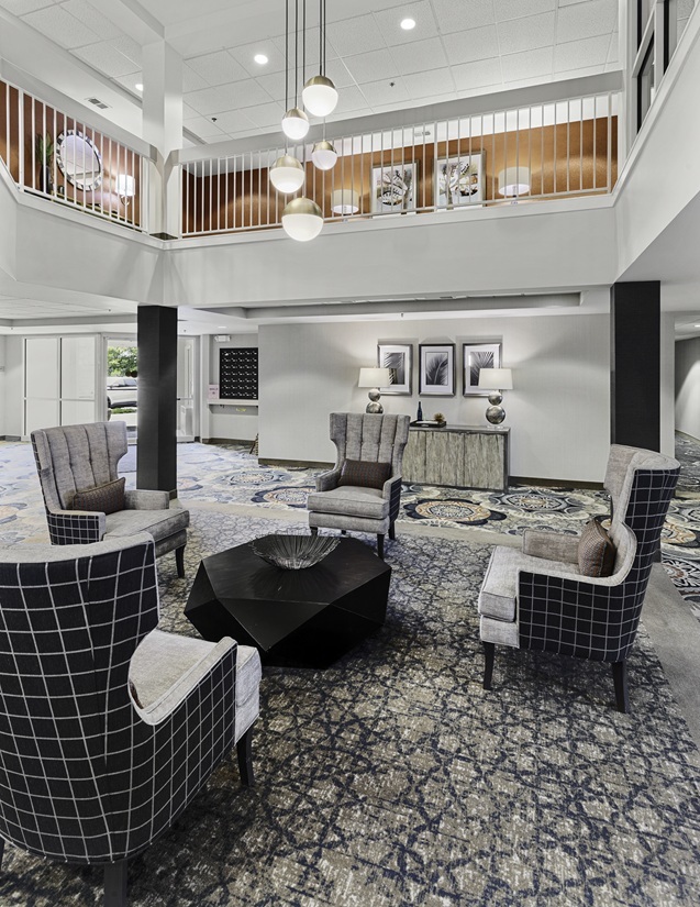 2000 Randi Drive, Unit 310 Aurora, IL 60504 - Photo 4 of 19 a living room with furniture and a rug