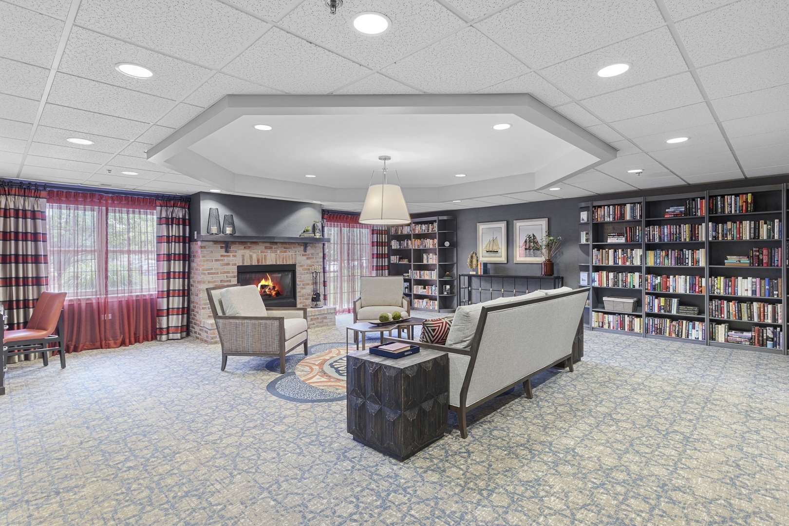 2000 Randi Drive, Unit 310 Aurora, IL 60504 - Photo 5 of 19 a living room with fireplace furniture and a large window