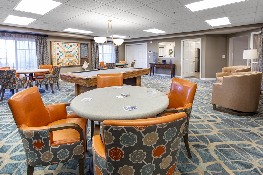 2000 Randi Drive, Unit 310 Aurora, IL 60504 - Photo 8 of 19 a view of a dining room with furniture and window
