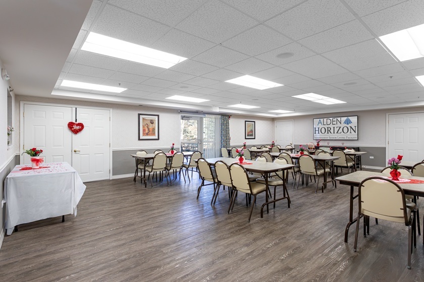 2000 Randi Drive, Unit 310 Aurora, IL 60504 - Photo 10 of 19 a living room with furniture and wooden floor