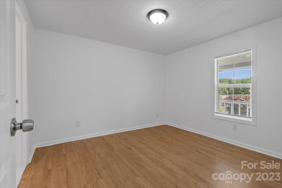 1724 Ruben Road Monroe, NC 28112 - Photo 18 of 28 an empty room with a window