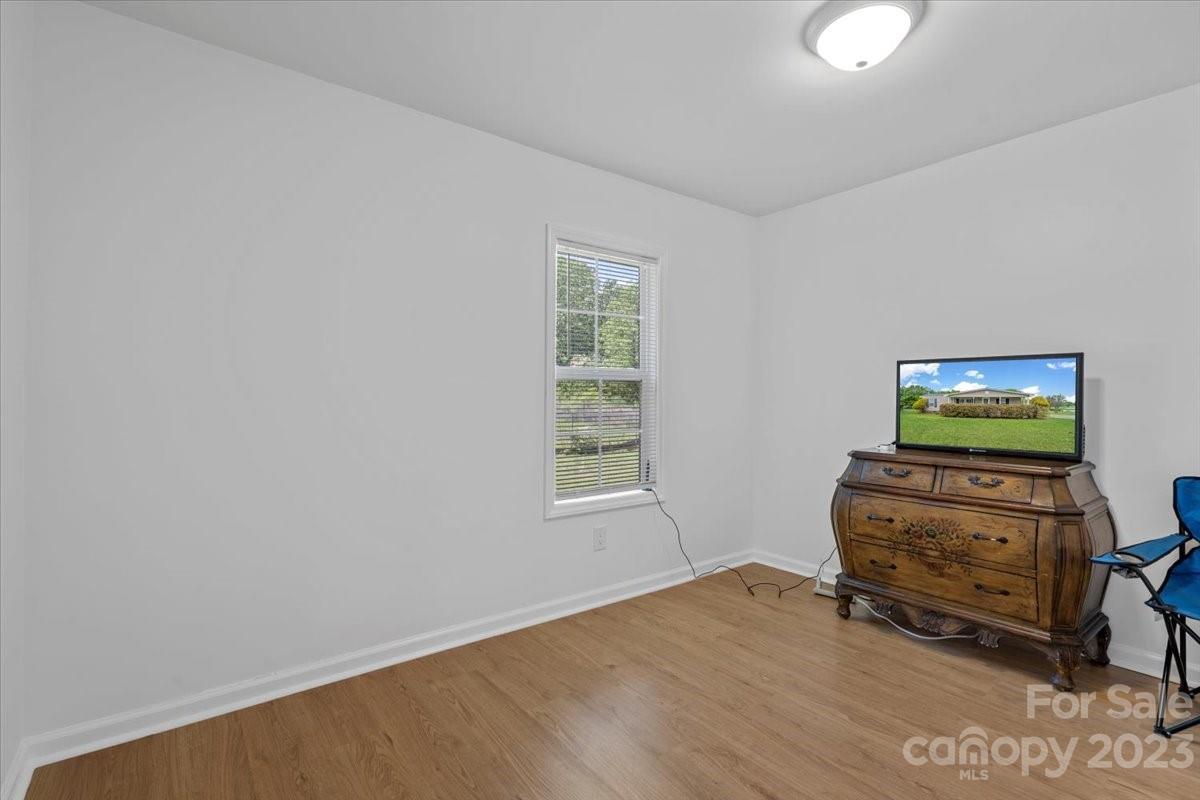 1724 Ruben Road Monroe, NC 28112 - Photo 20 of 28 an empty room with furniture and window