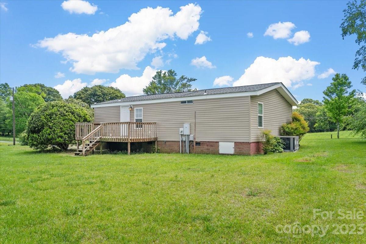 1724 Ruben Road Monroe, NC 28112 - Photo 27 of 28 a view of a house with a backyard