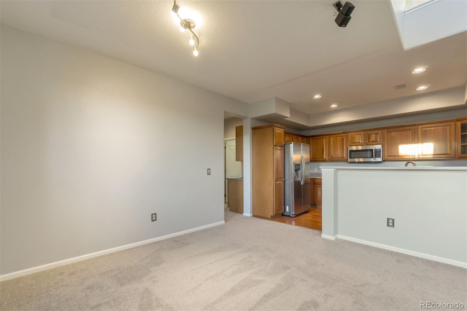 10533 Ashfield Street, Unit D Highlands Ranch, CO 80126 - Photo 19 of 25 a view of an empty room