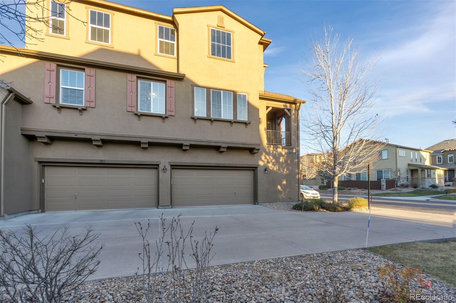 10533 Ashfield Street, Unit D Highlands Ranch, CO 80126 - Photo 23 of 25 a front view of a building