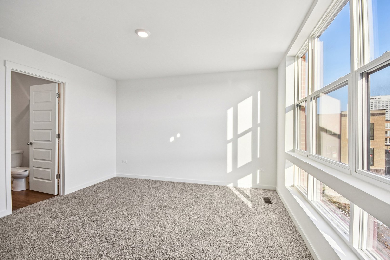 373 Summit Circle Lombard, IL 60148 - Photo 18 of 45 wooden floor in an empty room with a window