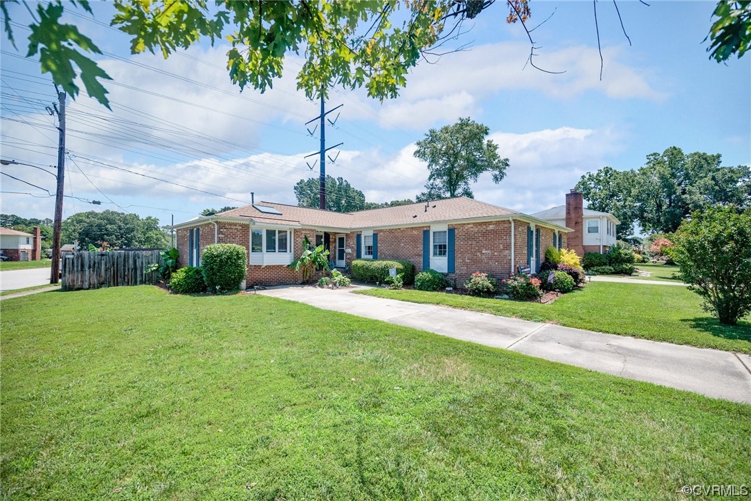 366 Brout Drive Hampton, VA 23666 - Photo 1 of 32 a front view of a house with garden