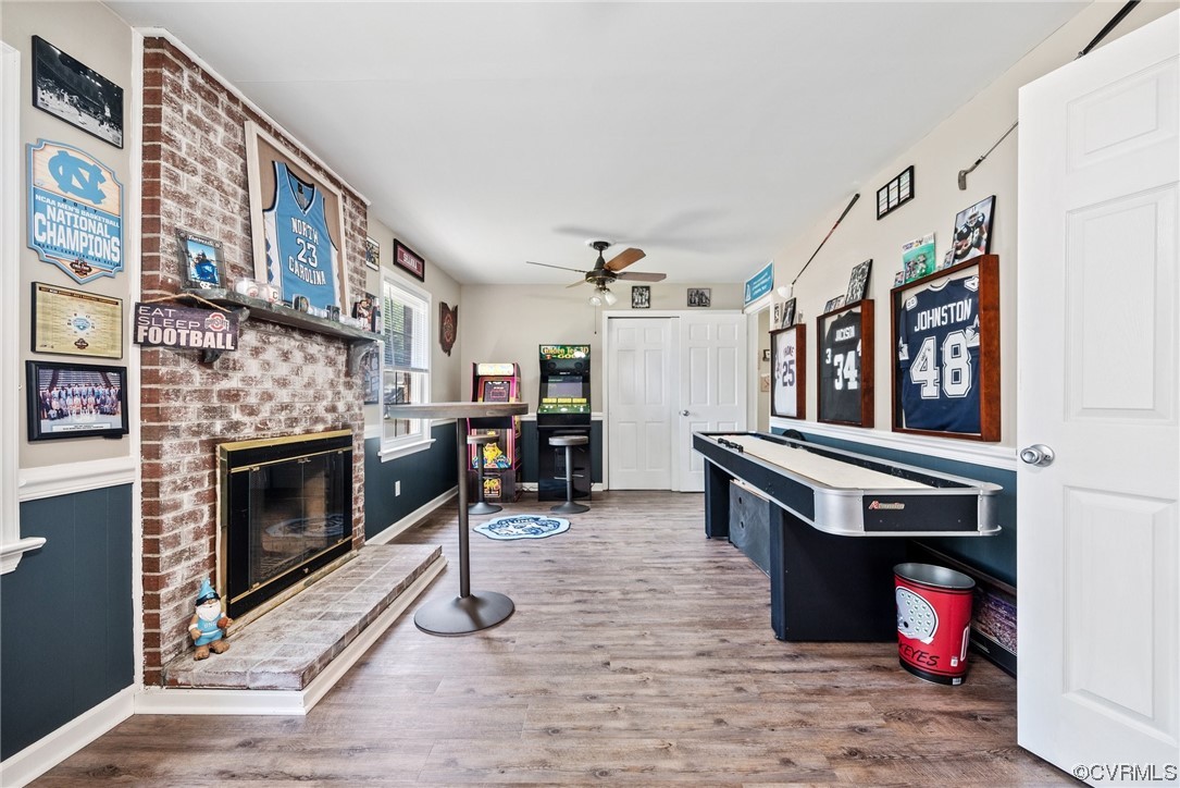 366 Brout Drive Hampton, VA 23666 - Photo 18 of 32 a living room with stainless steel appliances furniture a fireplace and a flat screen tv