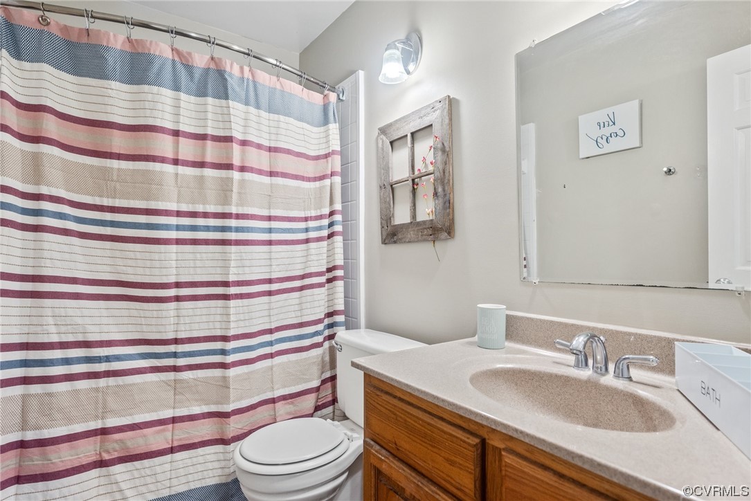 366 Brout Drive Hampton, VA 23666 - Photo 21 of 32 a bathroom with a sink toilet and shower