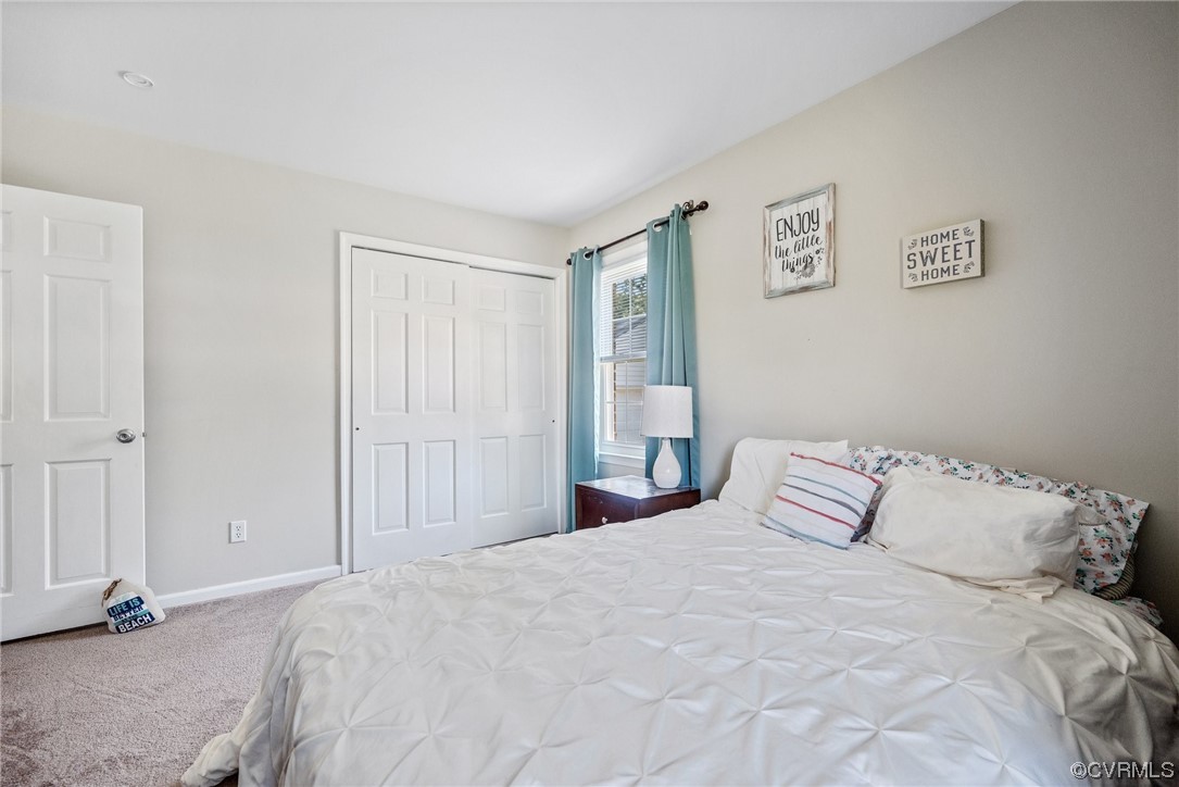 366 Brout Drive Hampton, VA 23666 - Photo 23 of 32 a bedroom with a bed and a window