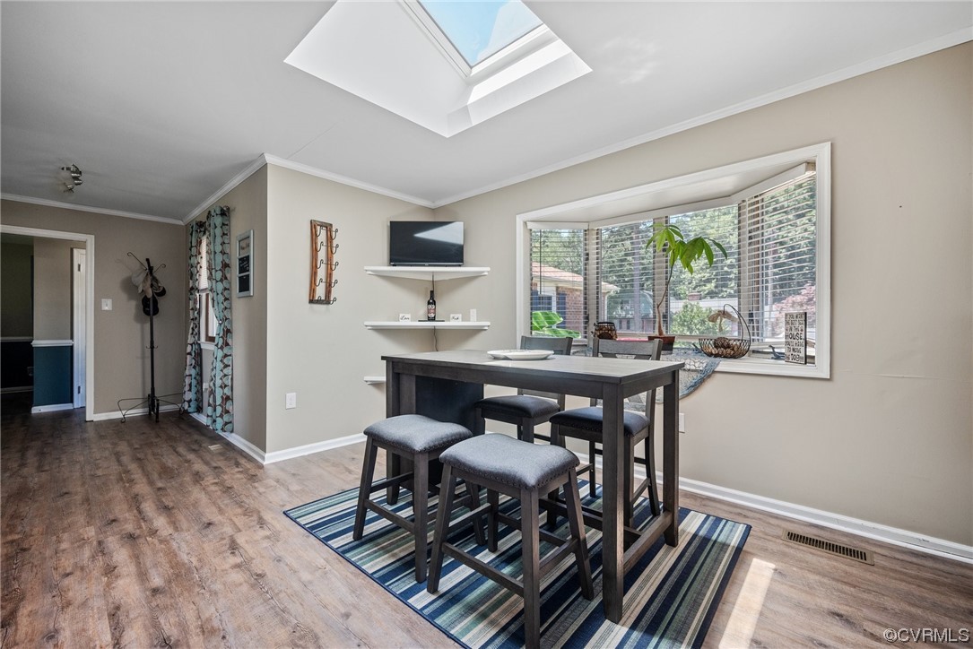 366 Brout Drive Hampton, VA 23666 - Photo 8 of 32 a view of a workspace with furniture and a window