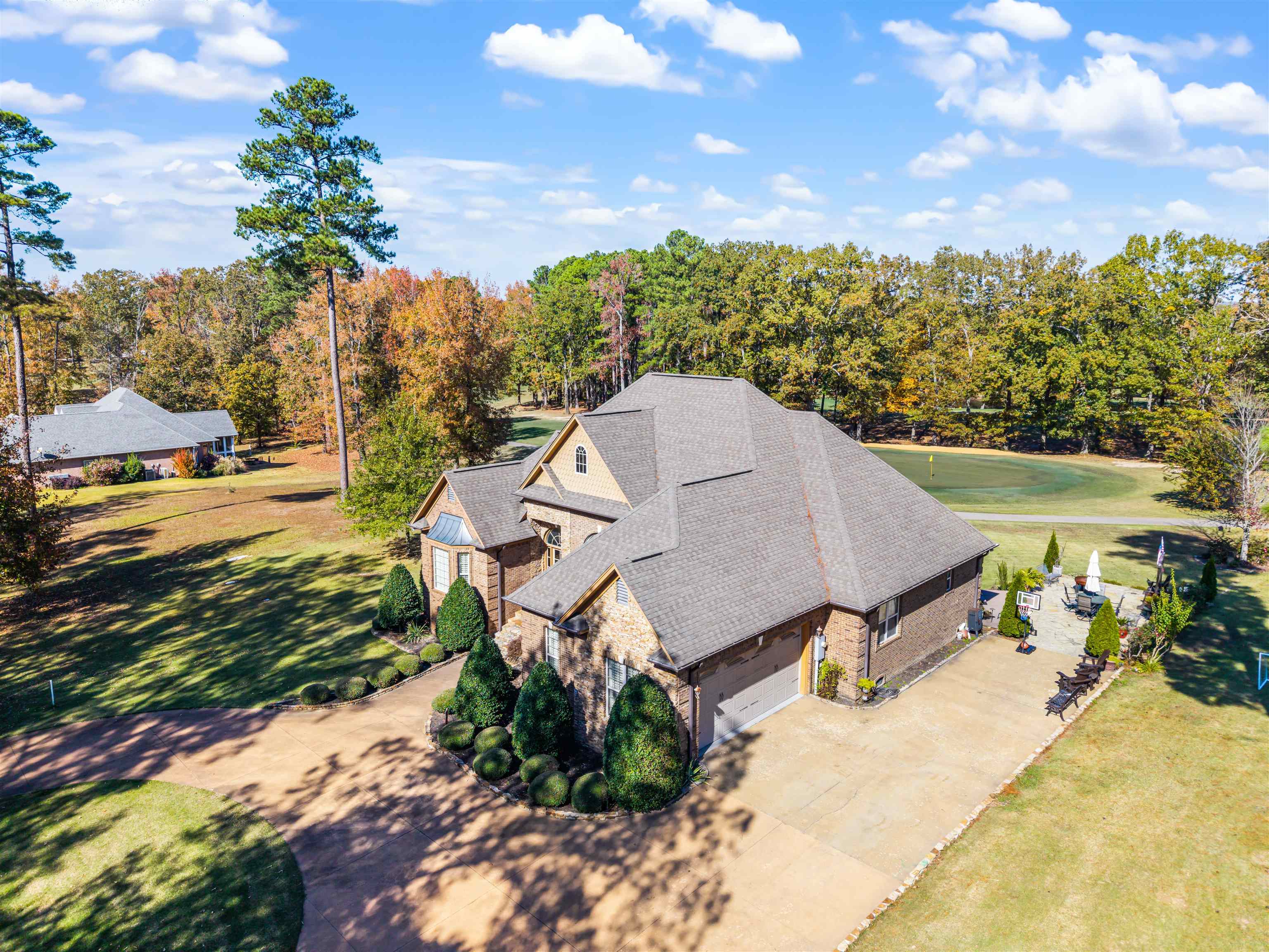 140 Legends Drive Counce, TN 38326 - Photo 3 of 30 View of subject property with a tree filled landscape