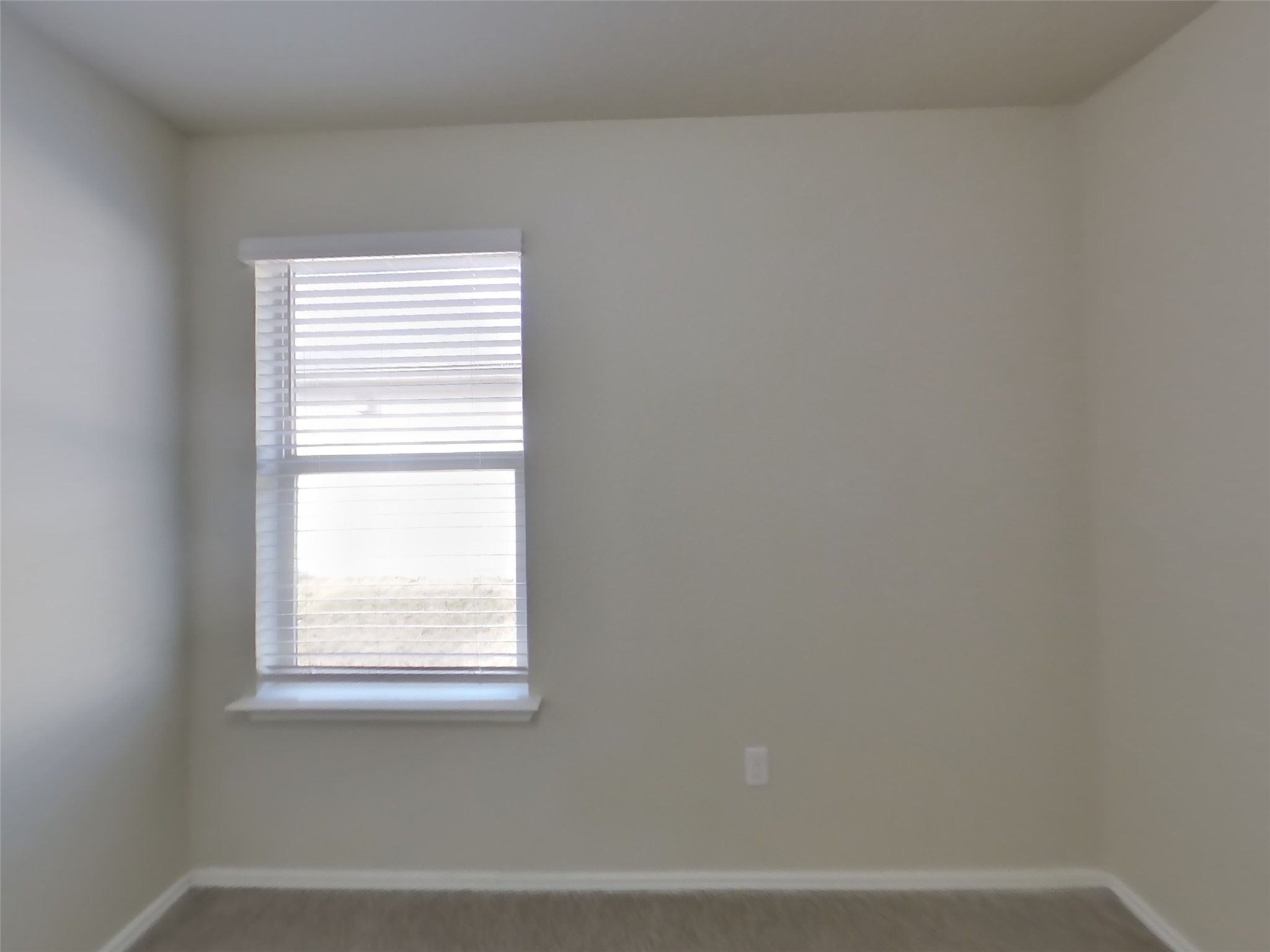 1152 Ibis Falls Loop Jarrell, TX 76537 - Photo 15 of 19 a view of a small space with a window