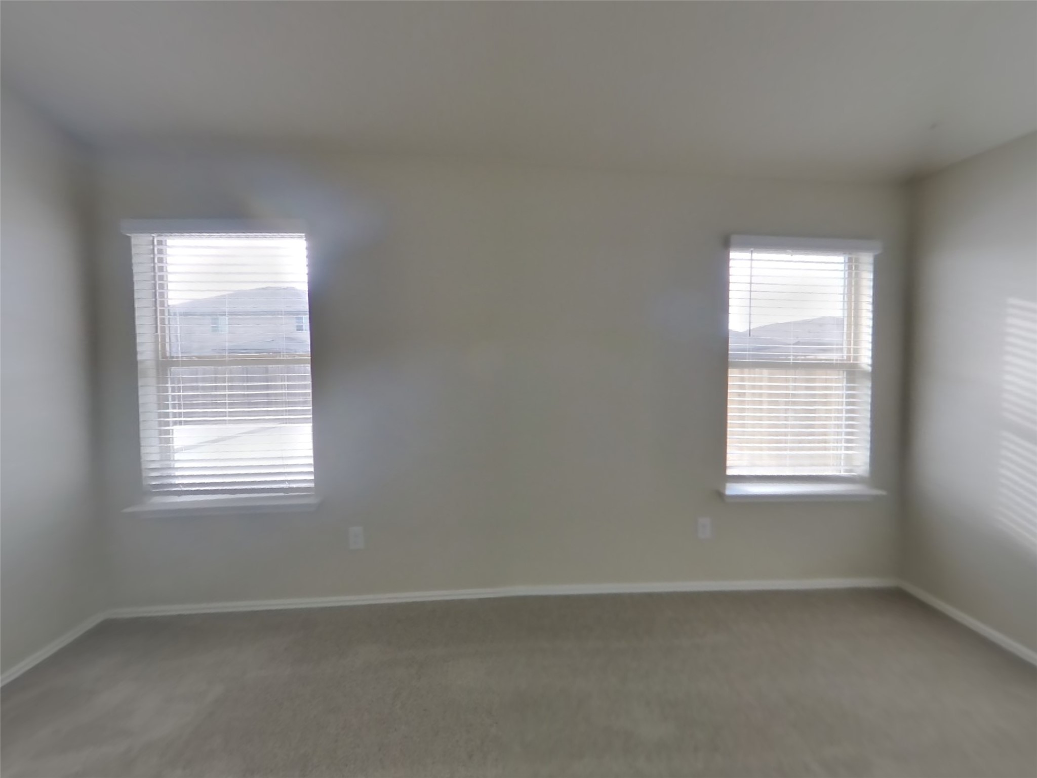 1152 Ibis Falls Loop Jarrell, TX 76537 - Photo 8 of 19 an empty room with a window
