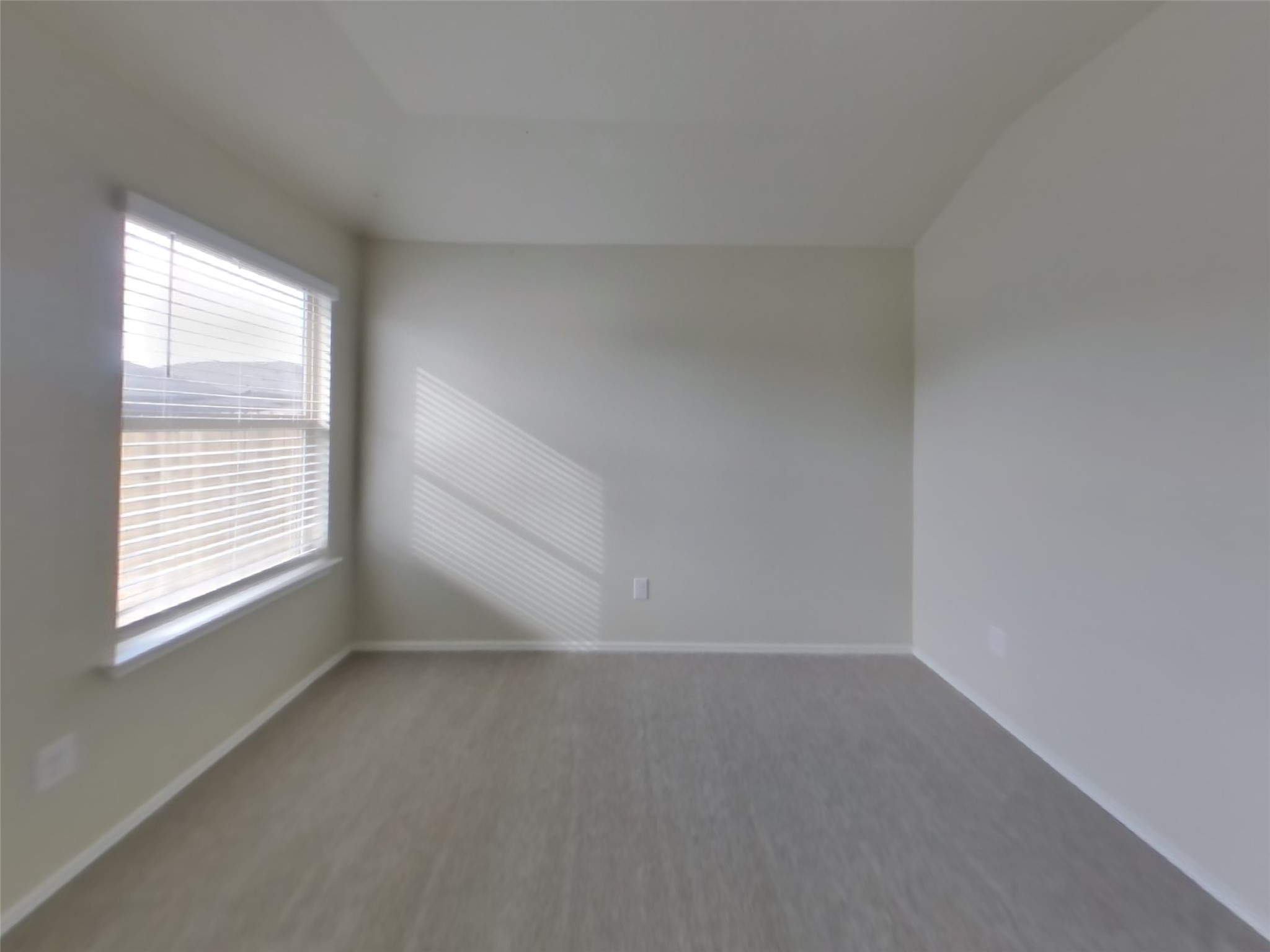 1152 Ibis Falls Loop Jarrell, TX 76537 - Photo 9 of 19 an empty room with a window