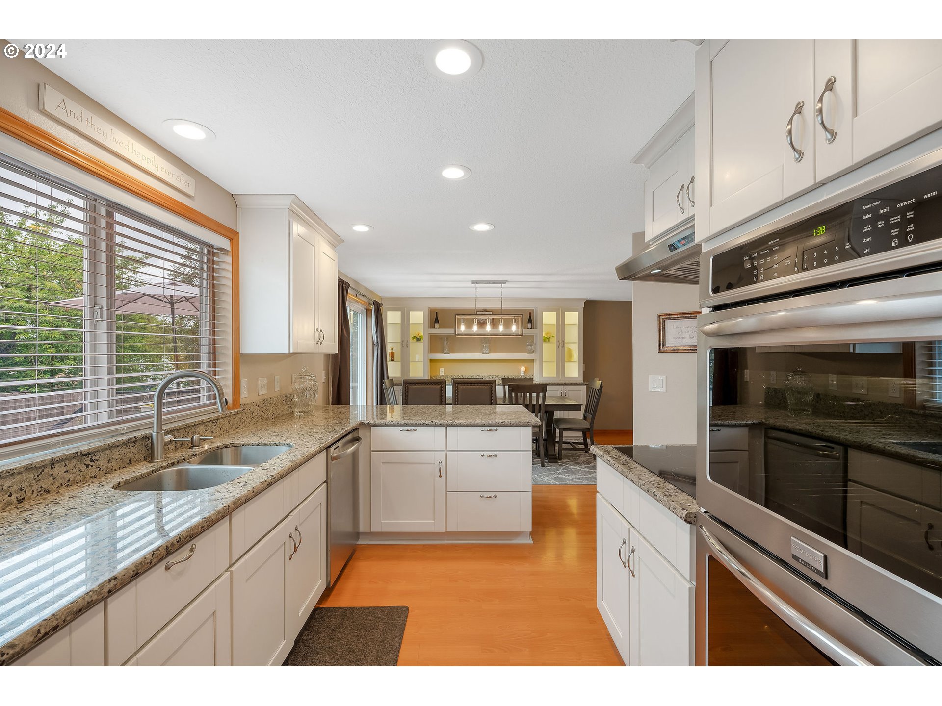 103 Park Street Gaston, OR 97119 - Photo 11 of 47 a kitchen with a sink stainless steel appliances and cabinets