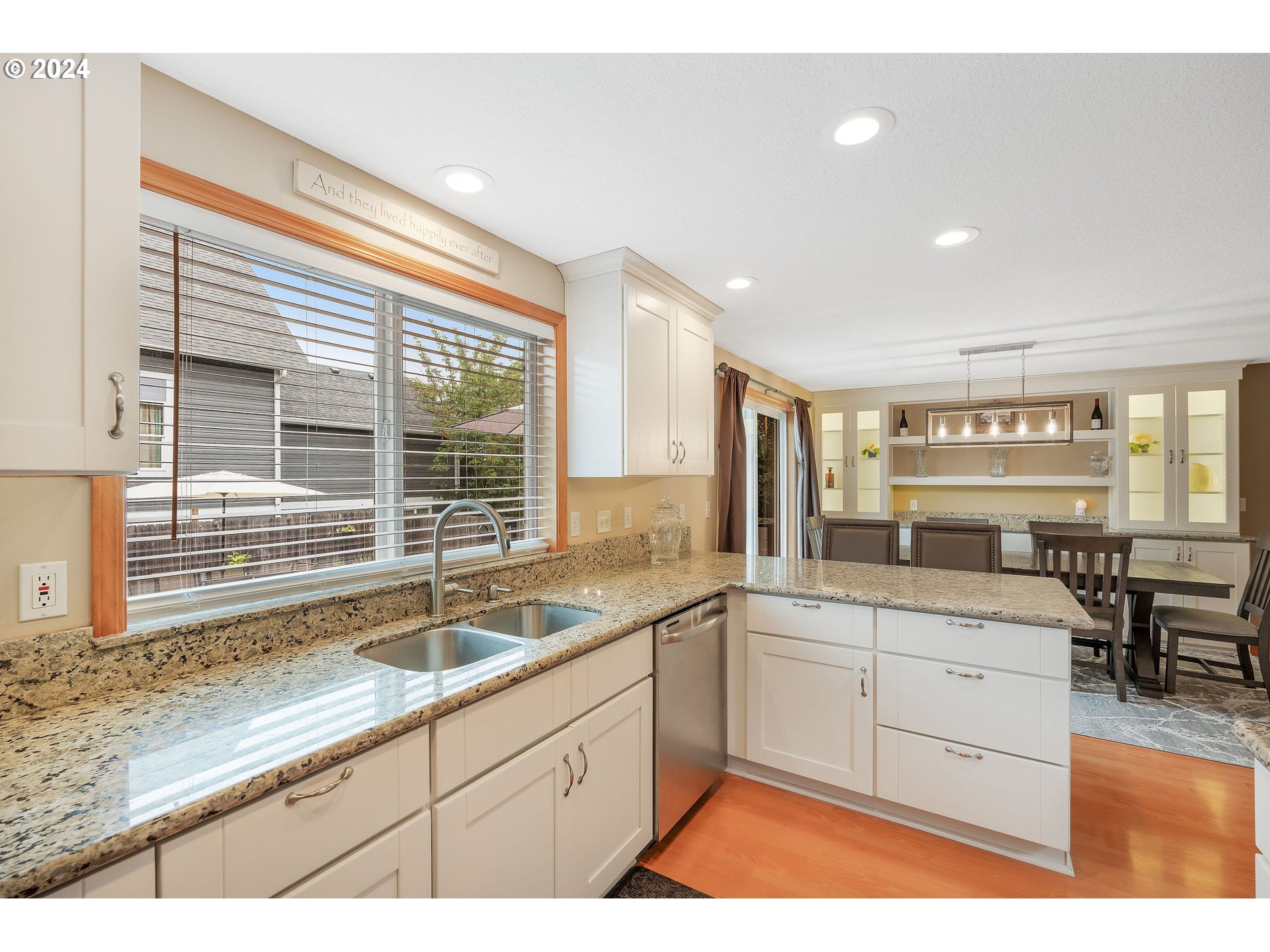 103 Park Street Gaston, OR 97119 - Photo 12 of 47 a kitchen with a sink and cabinets