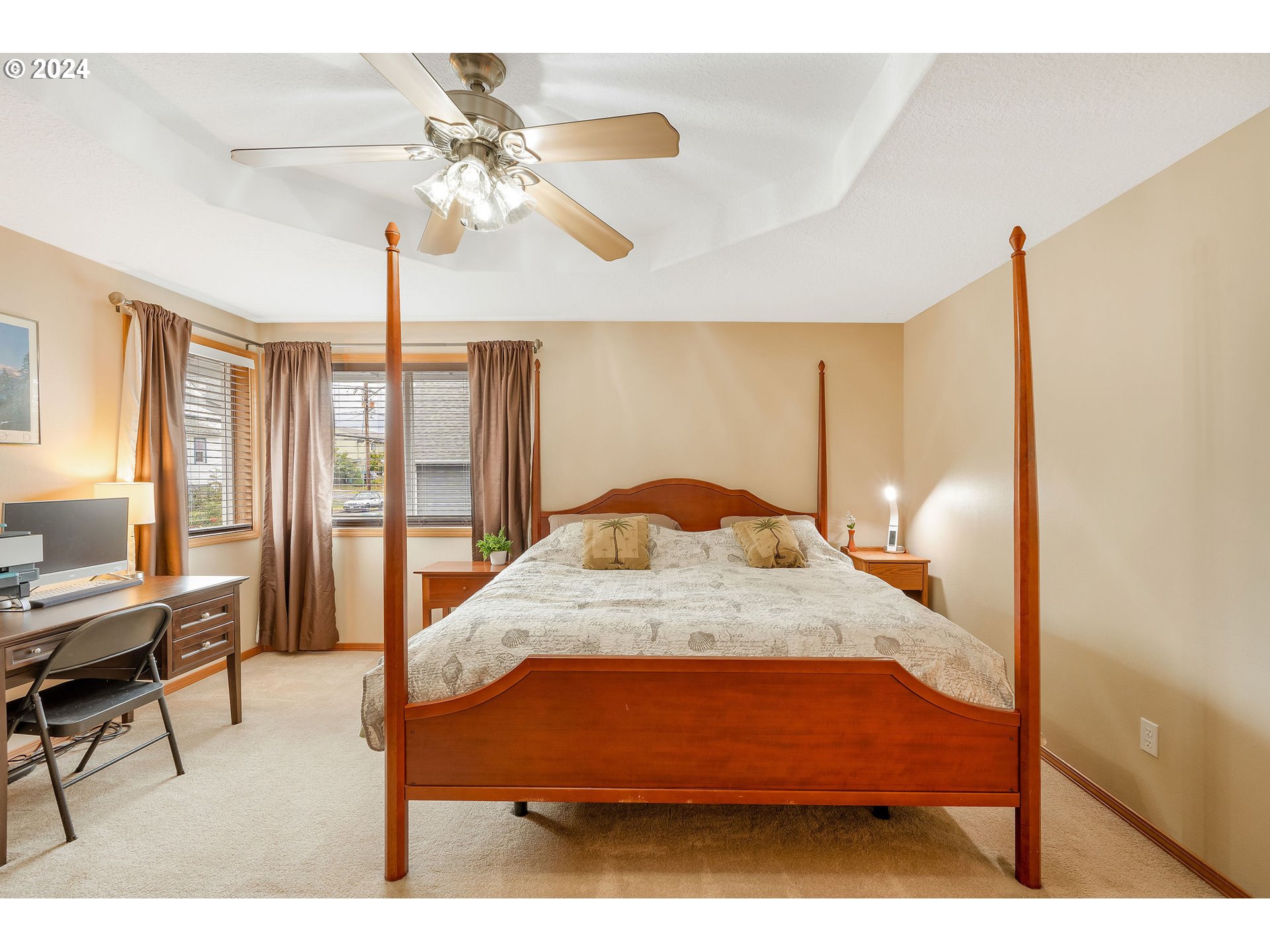 103 Park Street Gaston, OR 97119 - Photo 20 of 47 a bedroom with a bed and a chandelier