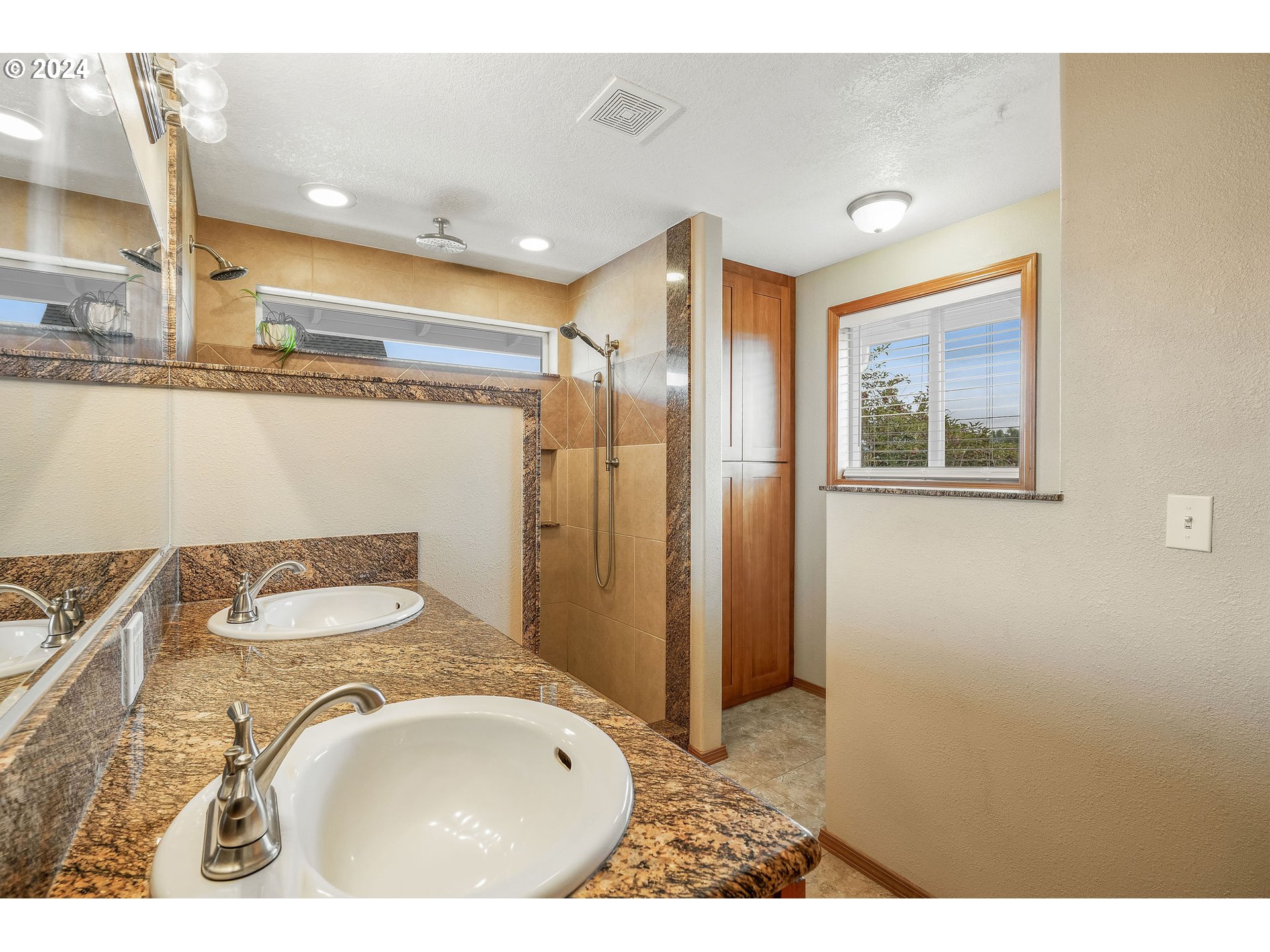 103 Park Street Gaston, OR 97119 - Photo 22 of 47 a bathroom with a sink and a mirror