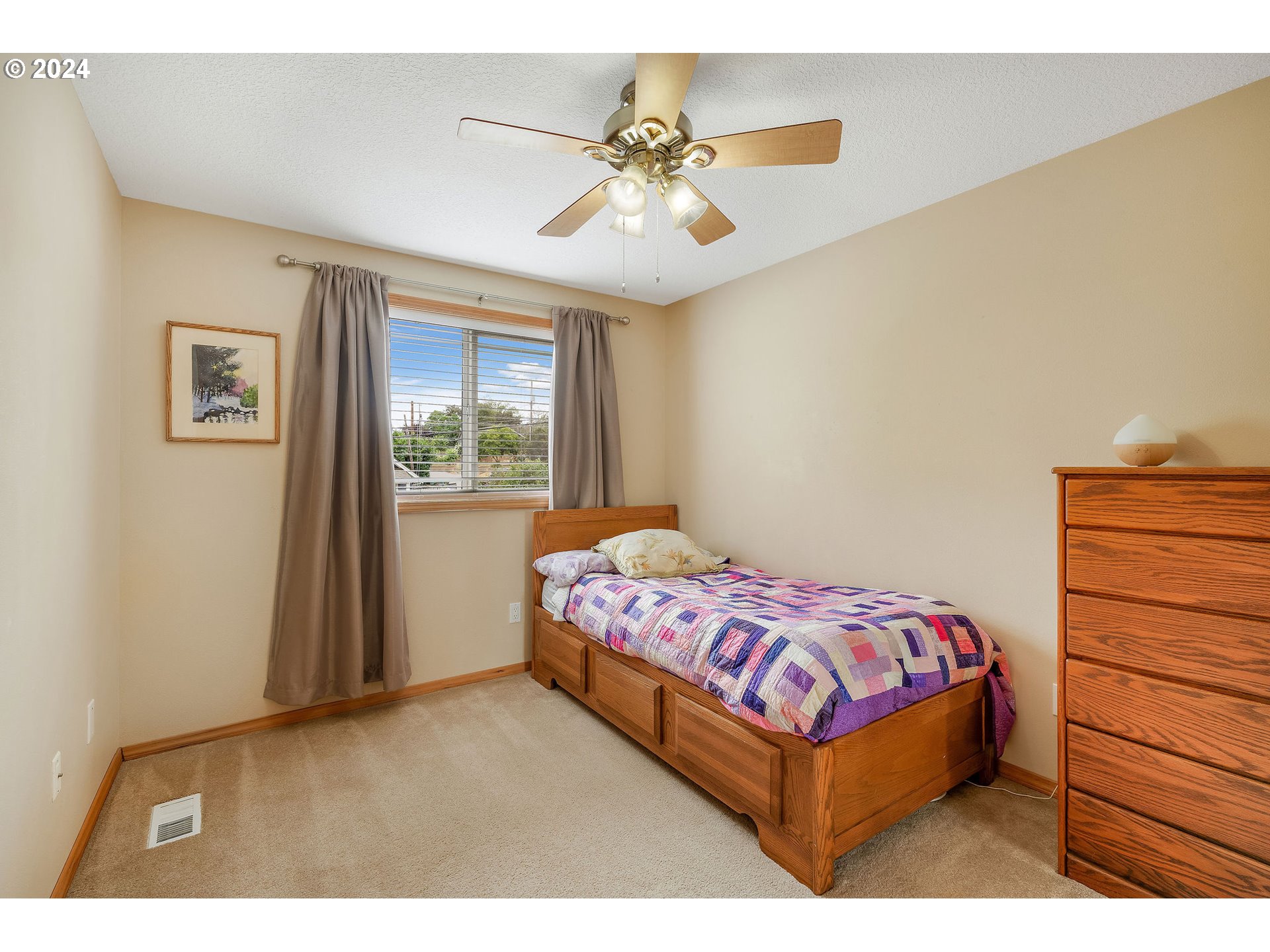 103 Park Street Gaston, OR 97119 - Photo 27 of 47 a bedroom with a bed and a window