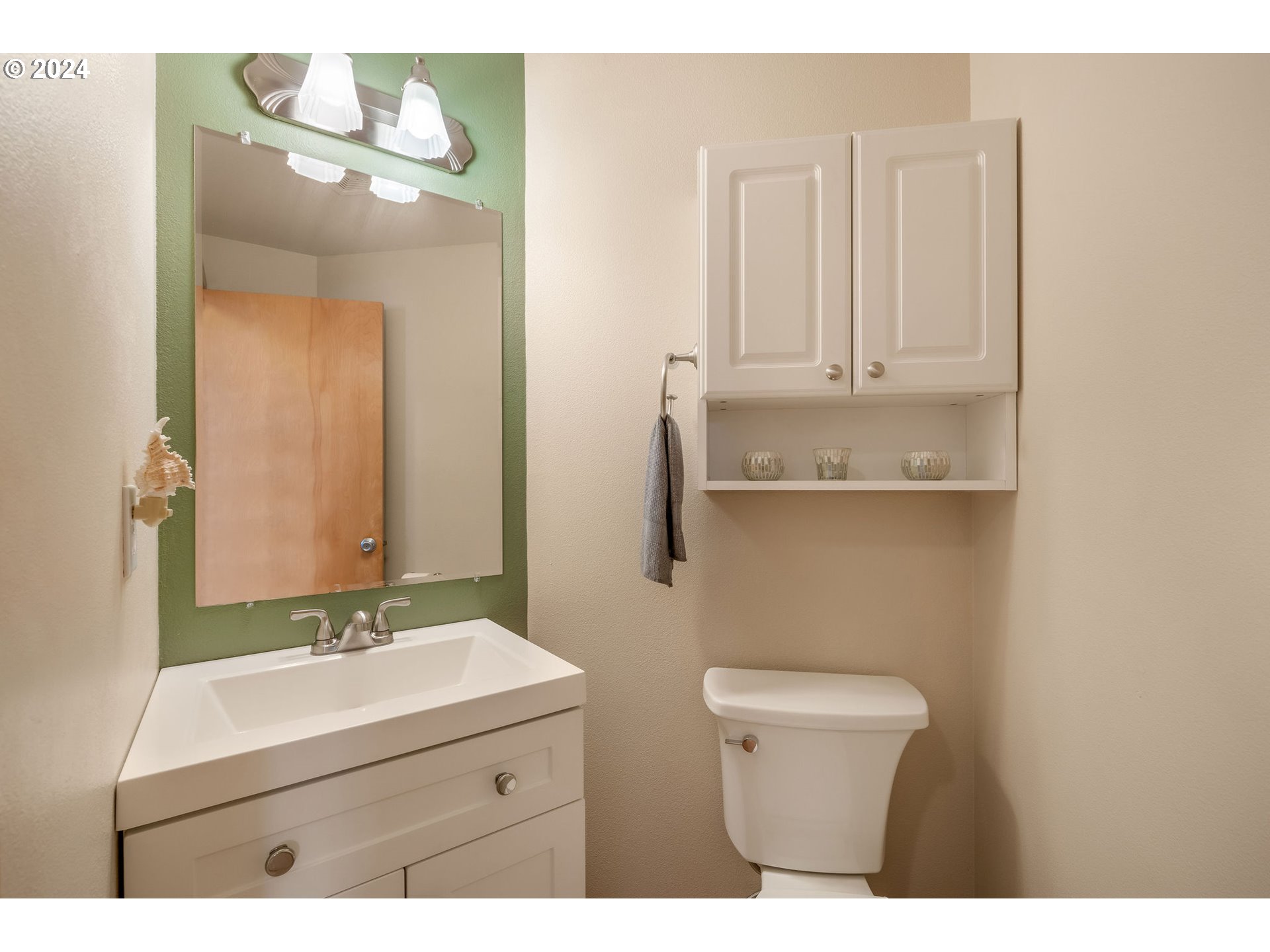 103 Park Street Gaston, OR 97119 - Photo 29 of 47 a bathroom with a sink a toilet and mirror