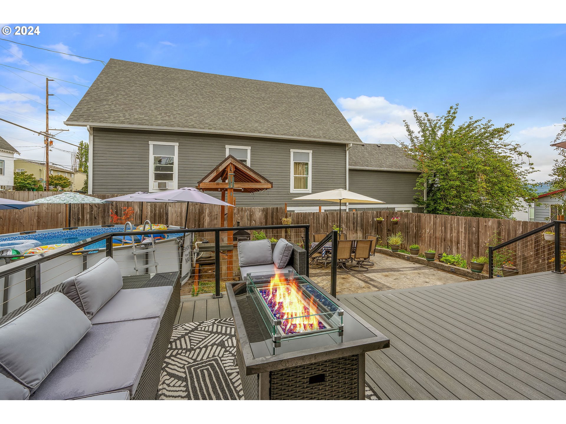 103 Park Street Gaston, OR 97119 - Photo 32 of 47 a view of a house with swimming pool and sitting area