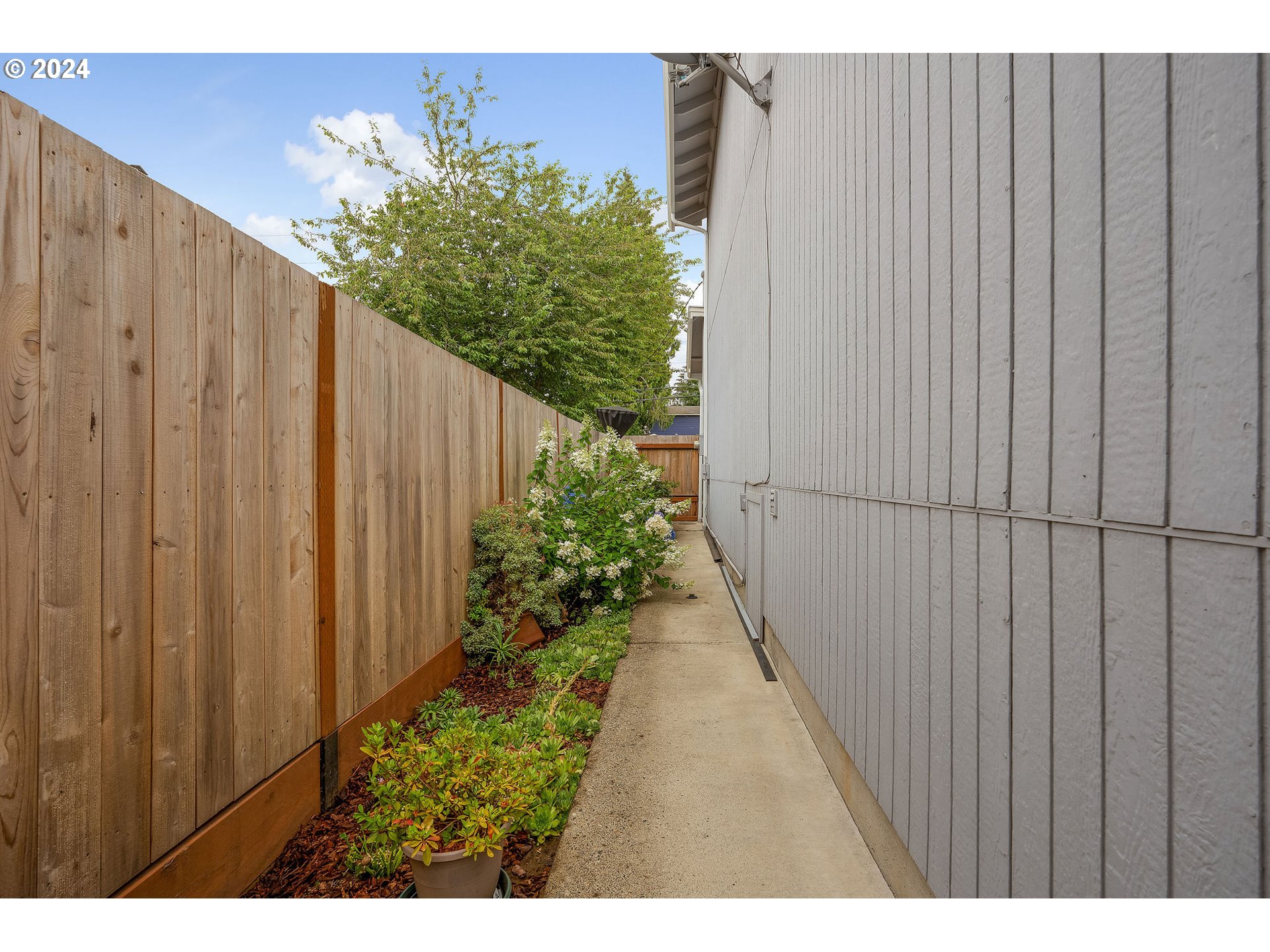 103 Park Street Gaston, OR 97119 - Photo 37 of 47 a view of a pathway with a wooden fence