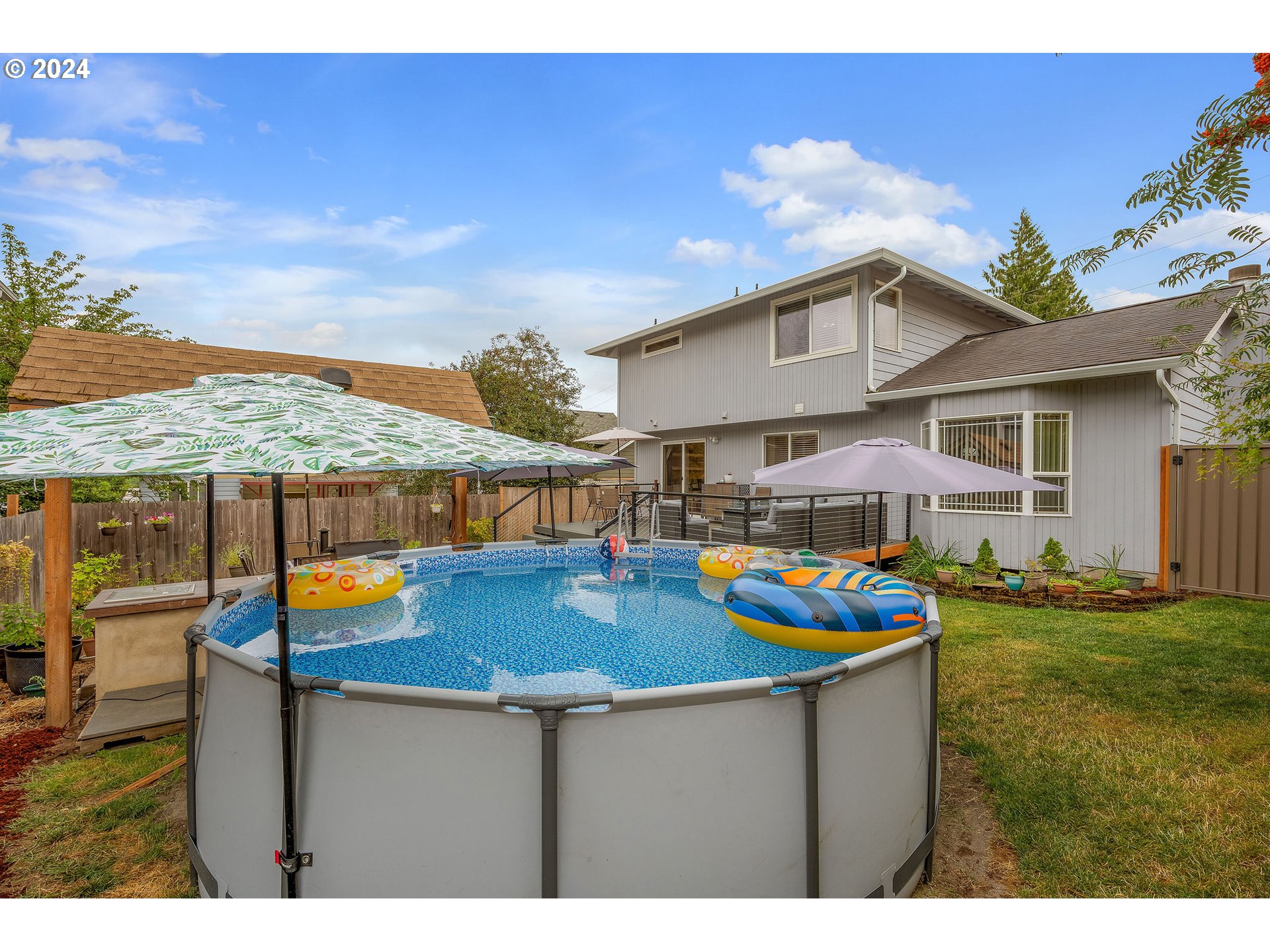 103 Park Street Gaston, OR 97119 - Photo 38 of 47 a view of a house with swimming pool and furniture