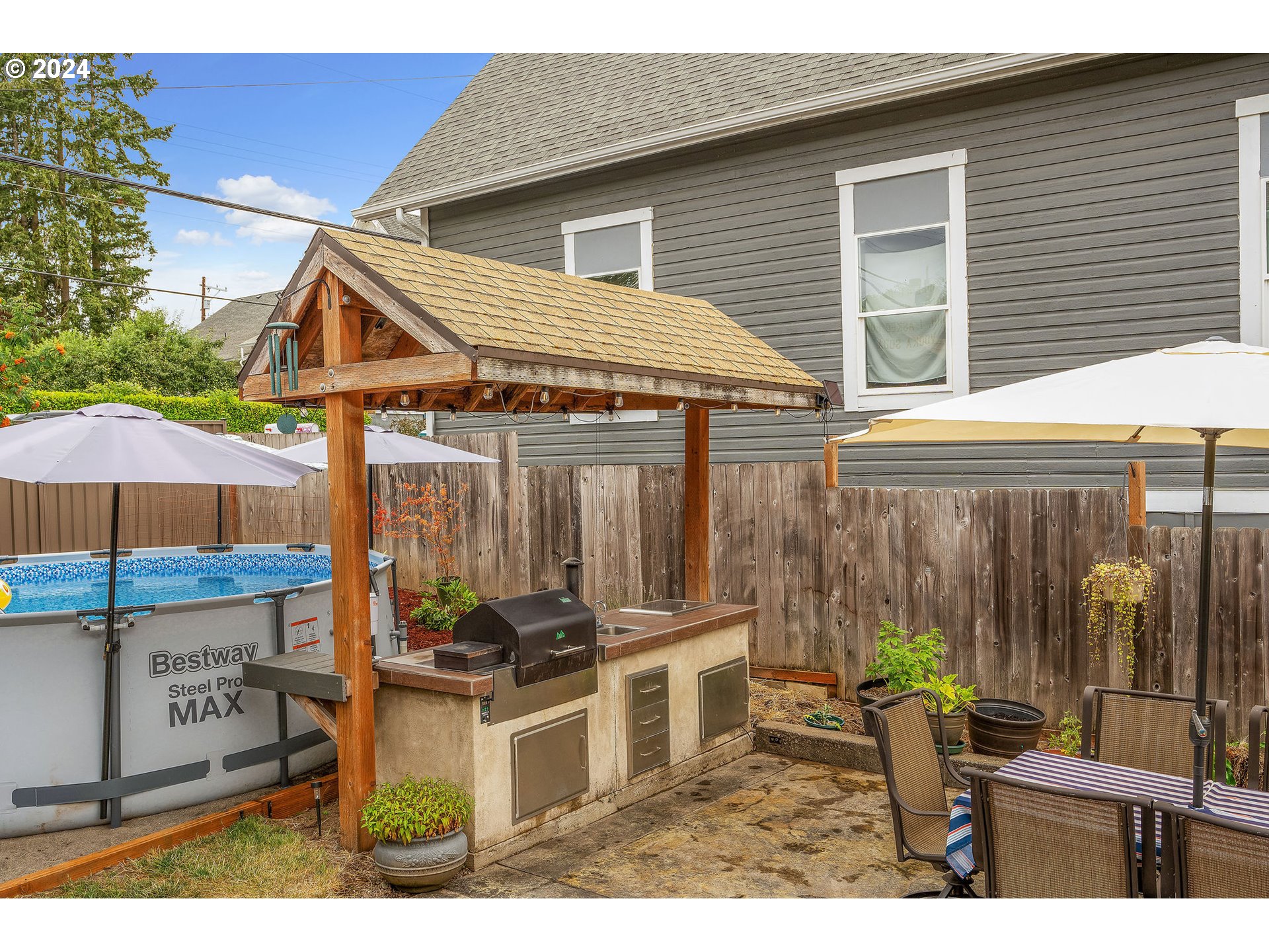 103 Park Street Gaston, OR 97119 - Photo 39 of 47 a view of a chairs and table in the patio