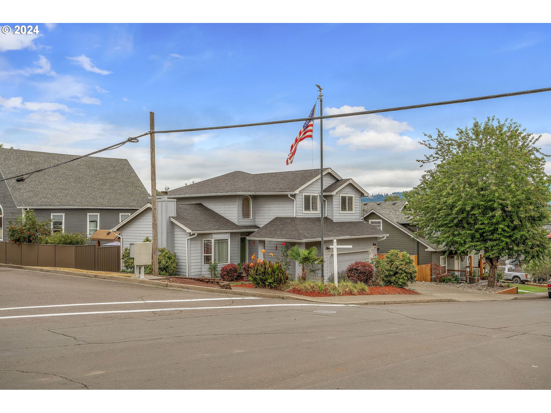 103 Park Street Gaston, OR 97119 - Photo 4 of 47 a front view of a building with street